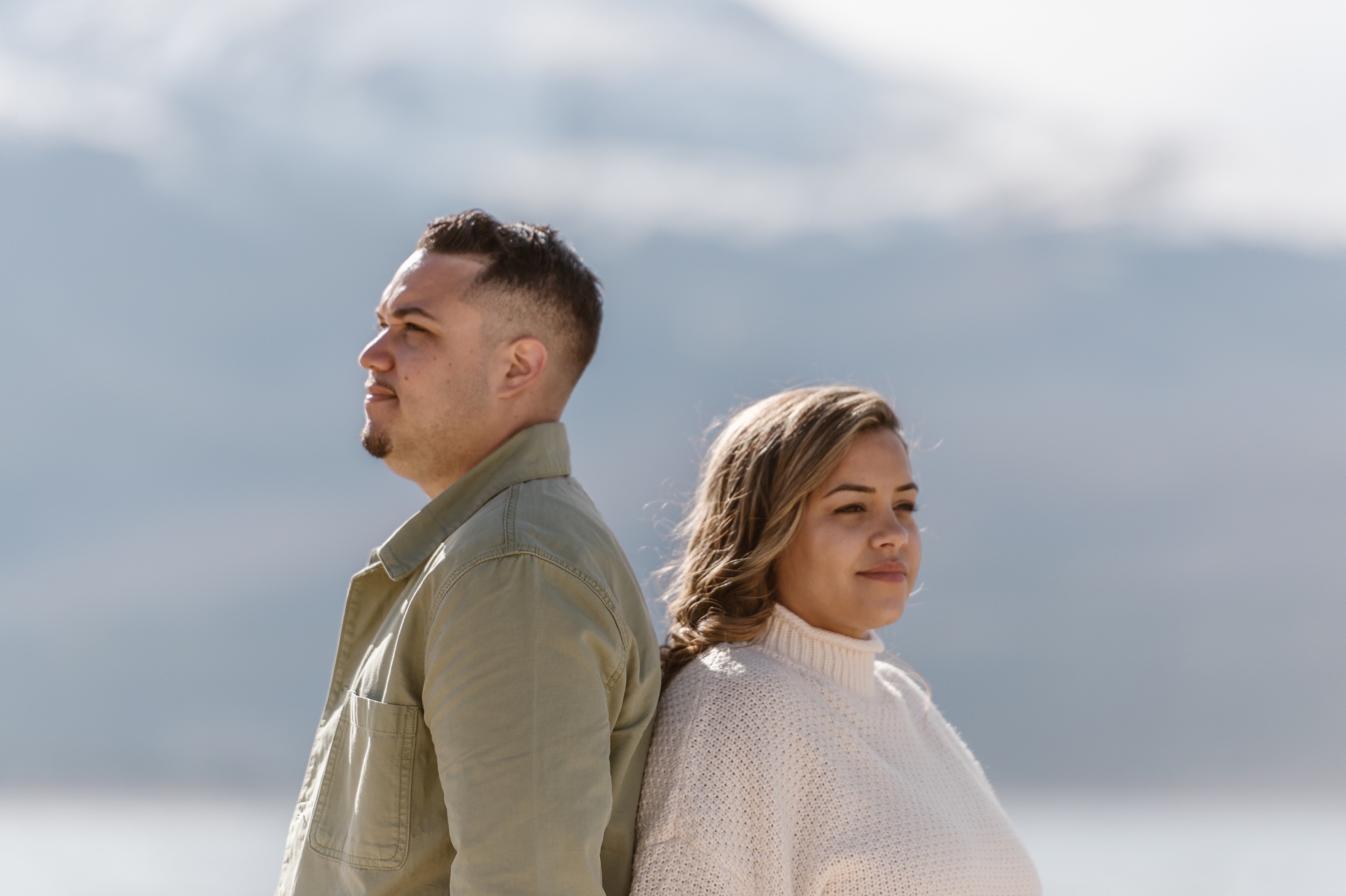 A couple poses for their Twin Lakes engagement photos at Twin Lakes, Colorado. Photo by Denver elopement photographer, Ashley Joyce Photography.