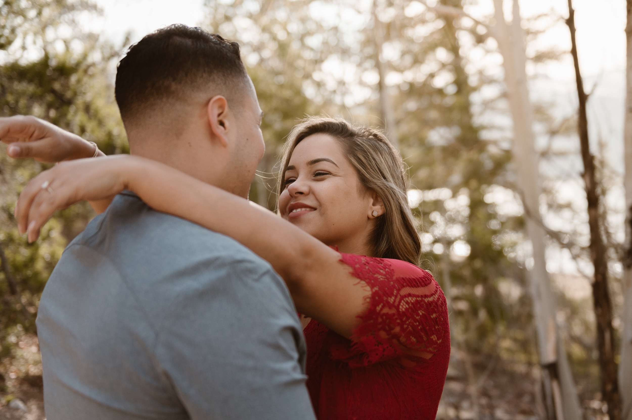 A couple poses for their Twin Lakes engagement photos at Twin Lakes, Colorado. Photo by Denver elopement photographer, Ashley Joyce Photography.