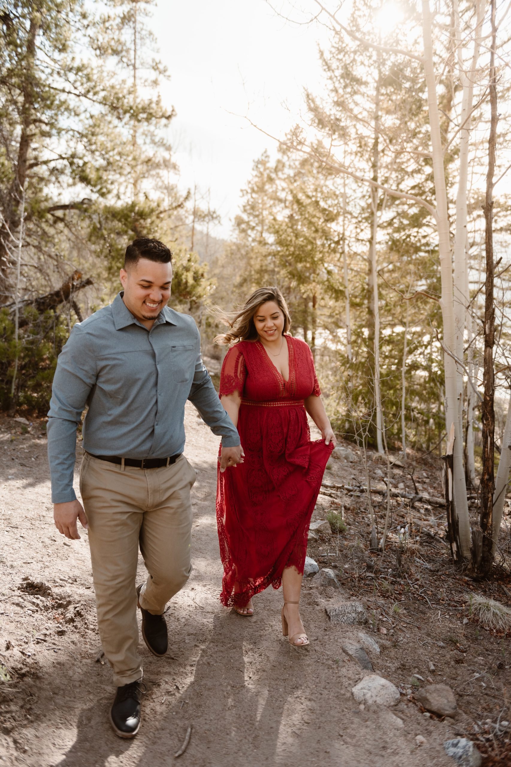 A couple poses for their Twin Lakes engagement photos at Twin Lakes, Colorado. Photo by Denver elopement photographer, Ashley Joyce Photography. 