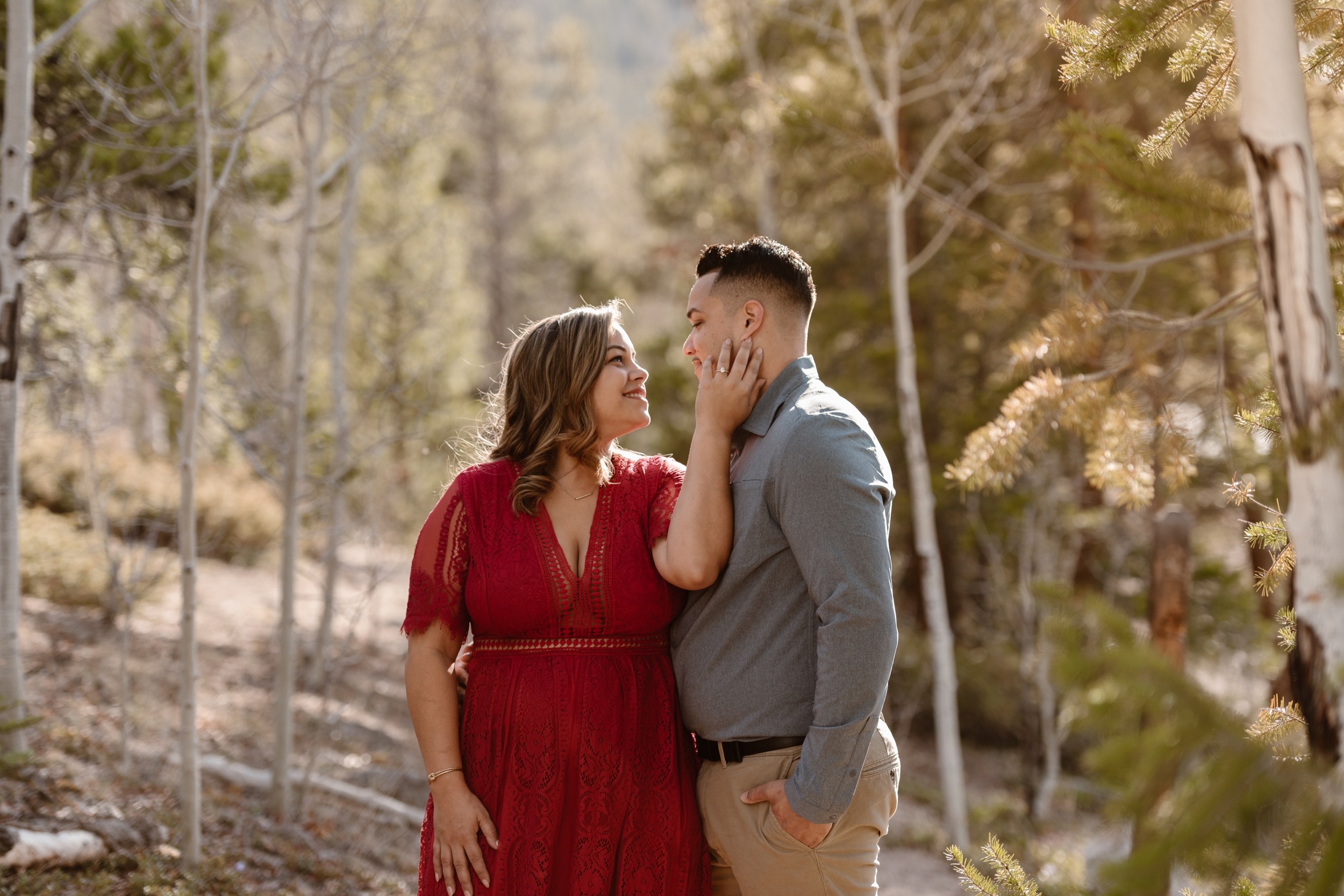 A couple poses for their Twin Lakes engagement photos at Twin Lakes, Colorado. Photo by Denver elopement photographer, Ashley Joyce Photography.