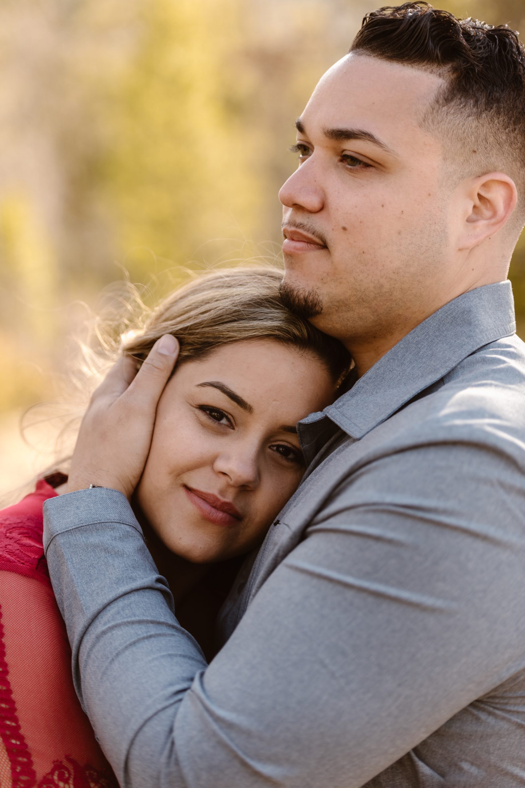 A couple poses for their Twin Lakes engagement photos at Twin Lakes, Colorado. Photo by Denver elopement photographer, Ashley Joyce Photography. 