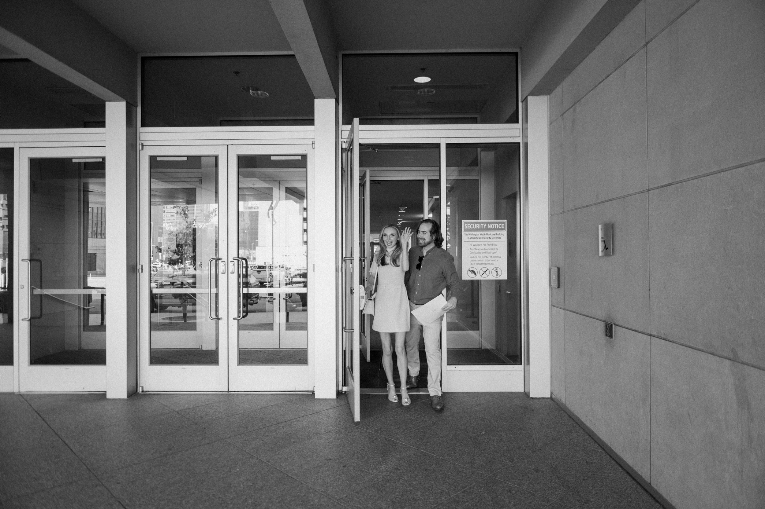 Courthouse wedding in downtown Denver for a Colorado elopement couple. Photo by Denver elopement photographer Ashley Joyce Photography, copyright 2022.