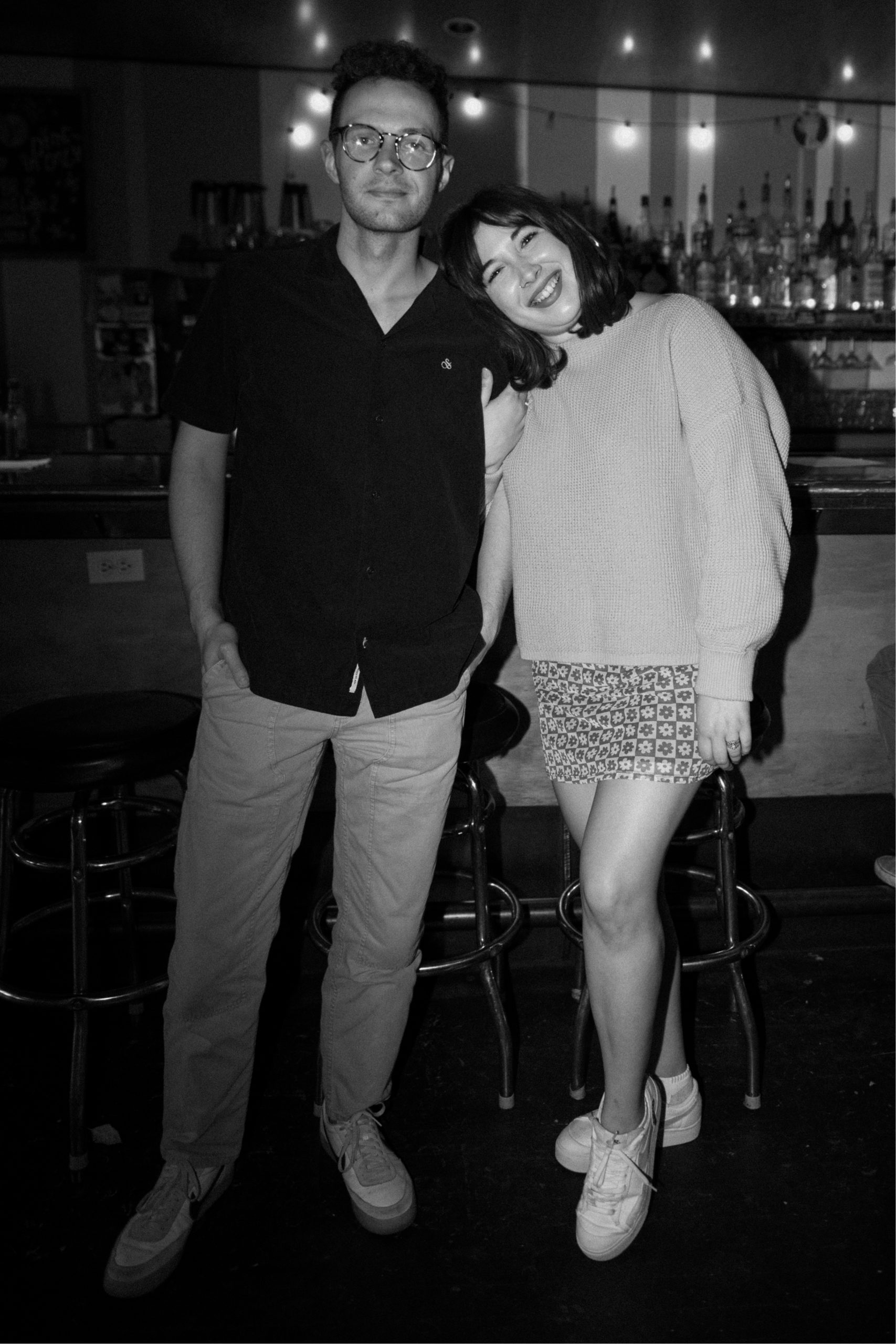 A fun engagement shoot at a bar in Denver. Sputnik, Denver bar engagement photos. Colorado engagement photos by Ashley Joyce.