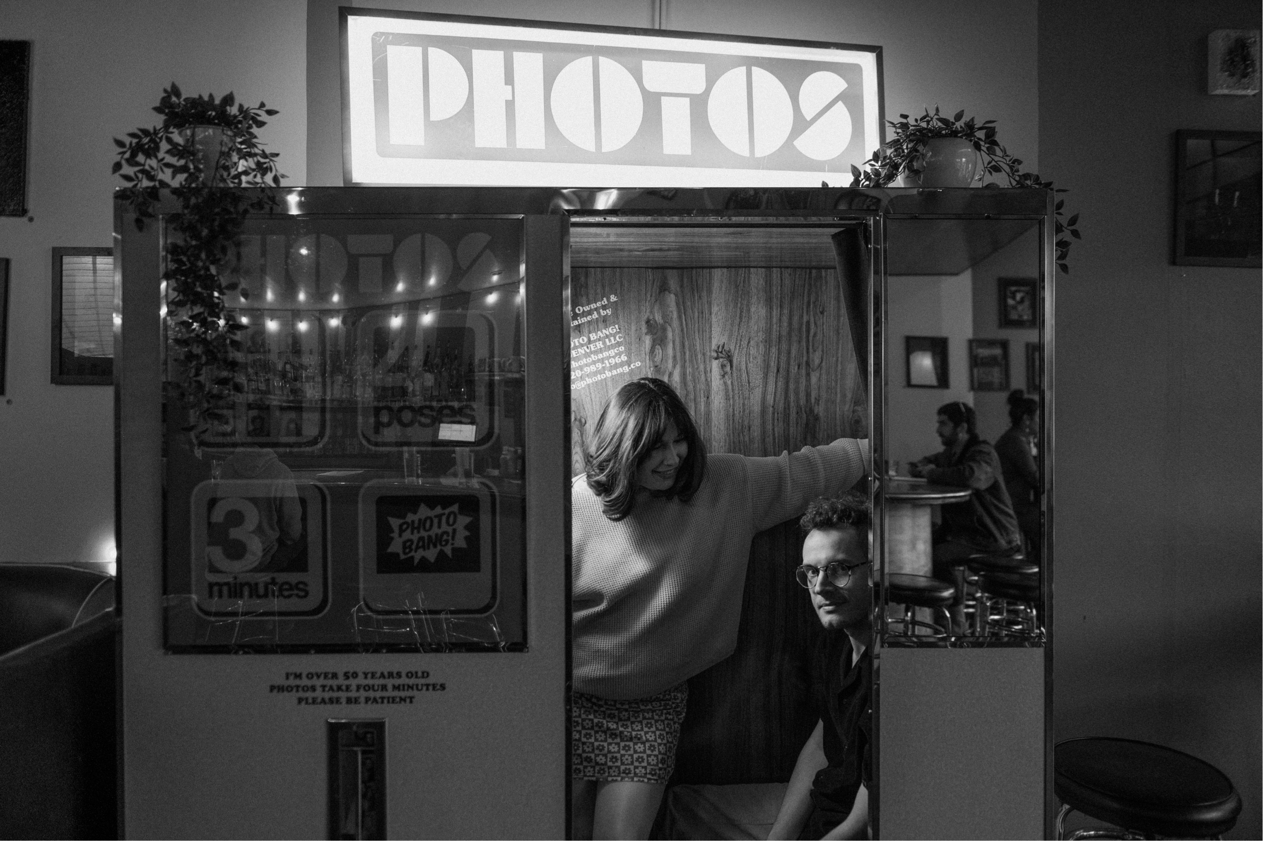 A fun engagement shoot at a bar in Denver. Sputnik, Denver bar engagement photos. Colorado engagement photos by Ashley Joyce.