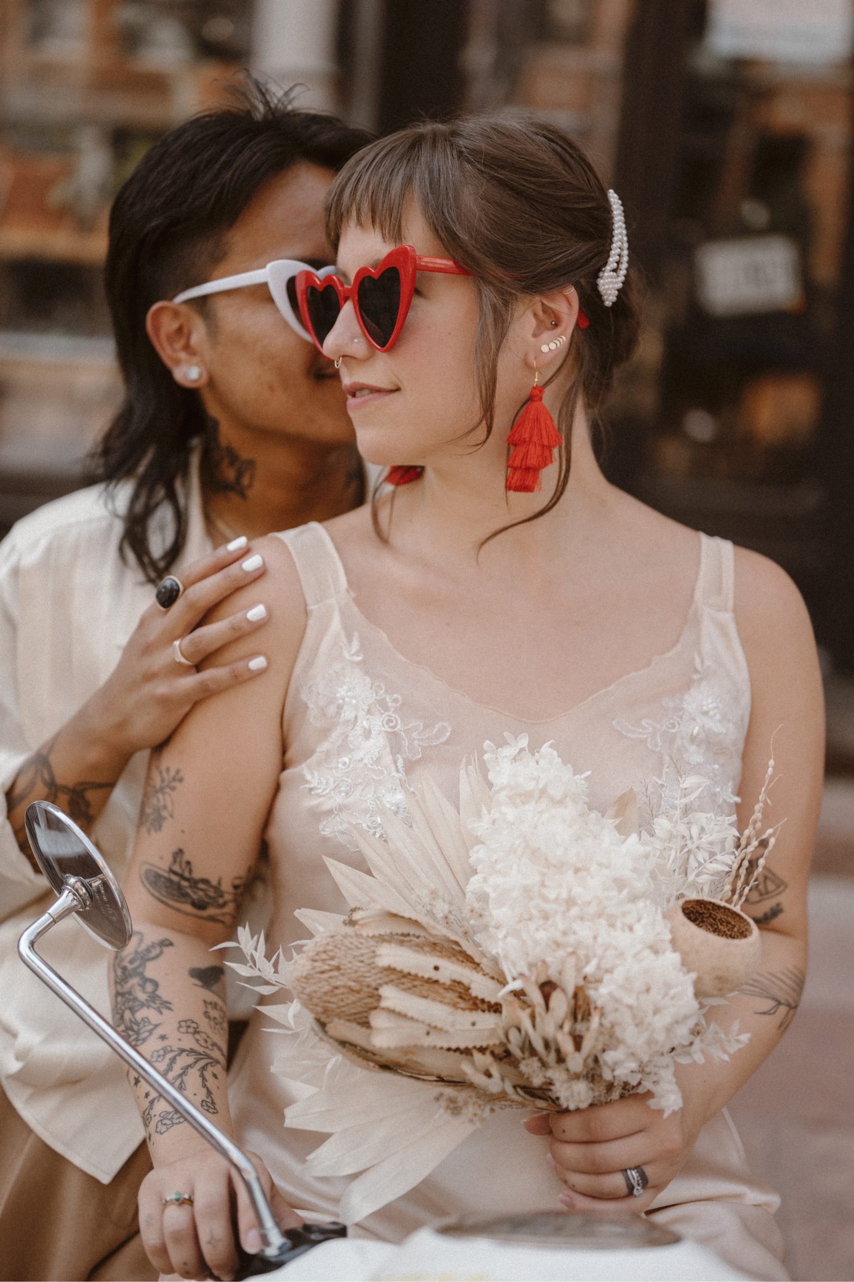 A romantic Italian-inspired downtown Denver elopement, complete with vintage outfits and an Italian scooter. Set in Larimer Square in downtown Denver.