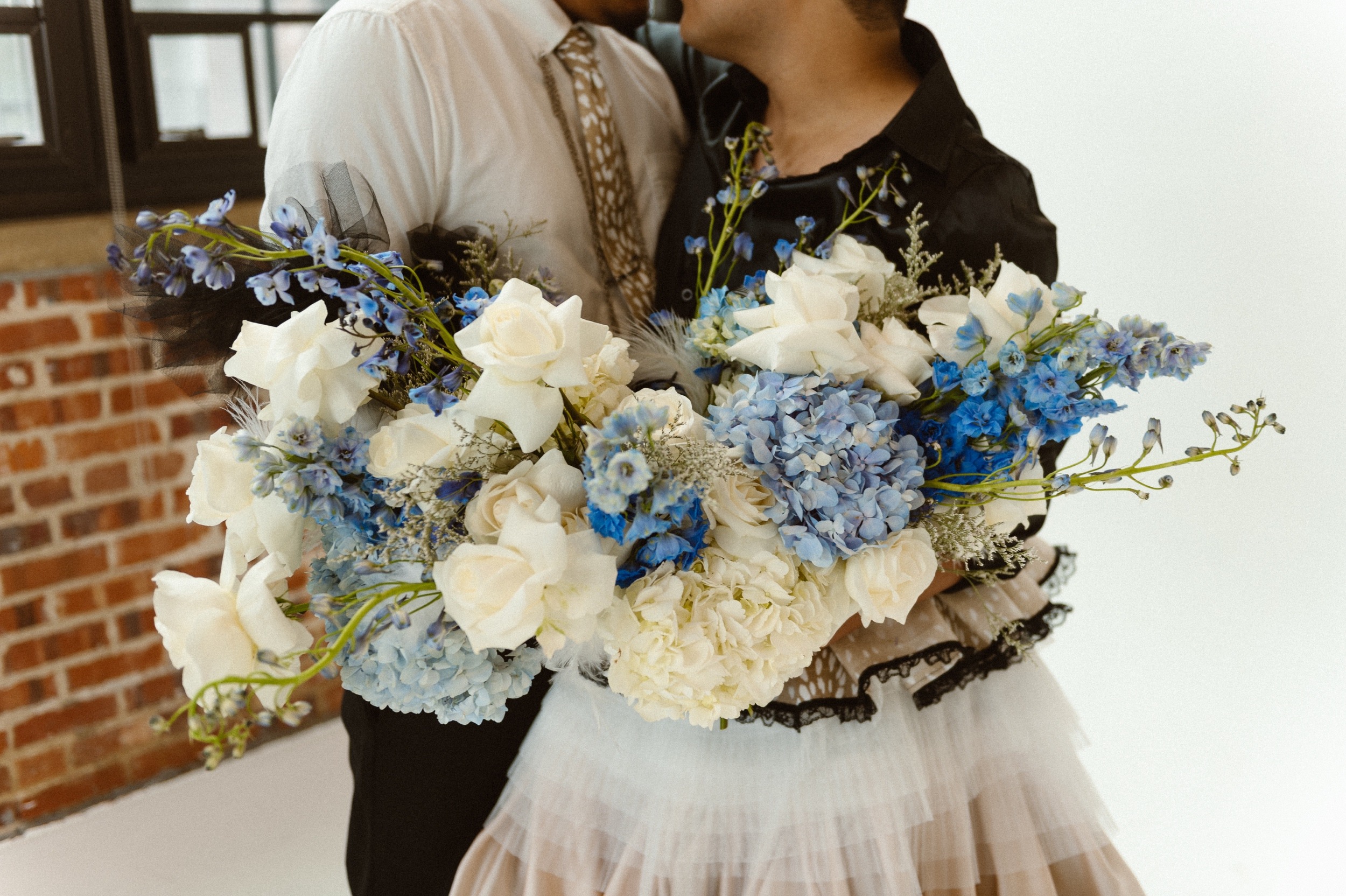 Photo of a Colorado elopement couple for their gay styled elopement. Photo by Denver elopement photographer, Ashley Joyce Photography, copyright 2021.