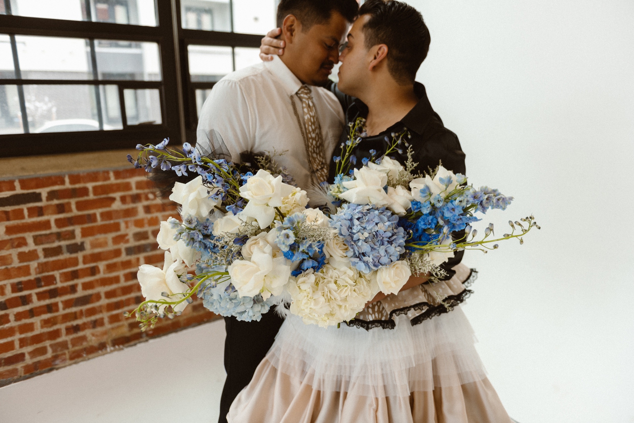 Photo of a Colorado elopement couple for their gay styled elopement. Photo by Denver elopement photographer, Ashley Joyce Photography, copyright 2021.