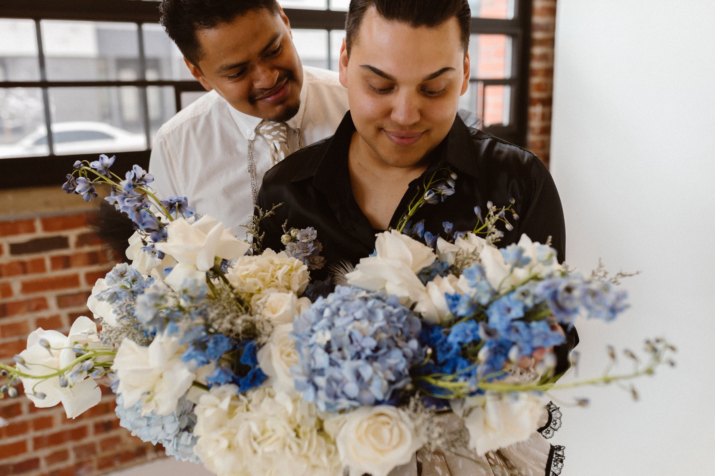 Photo of a Colorado elopement couple for their gay styled elopement. Photo by Denver elopement photographer, Ashley Joyce Photography, copyright 2021.