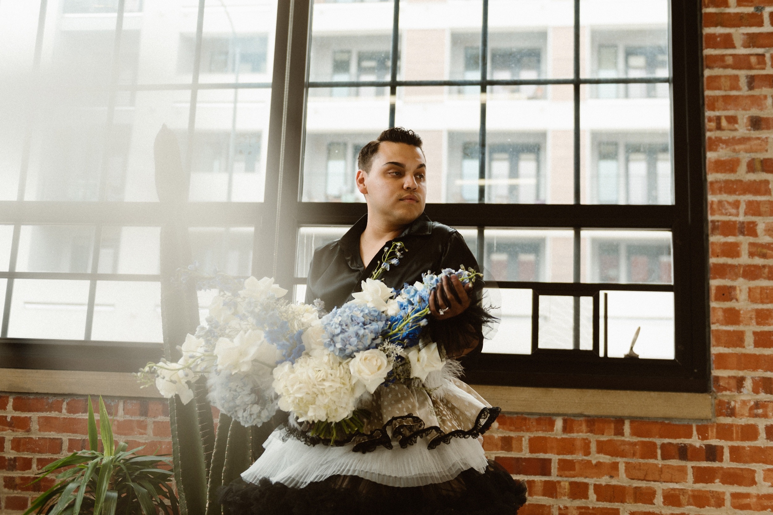 Photo of a Colorado elopement couple for their gay styled elopement. Photo by Denver elopement photographer, Ashley Joyce Photography, copyright 2021.