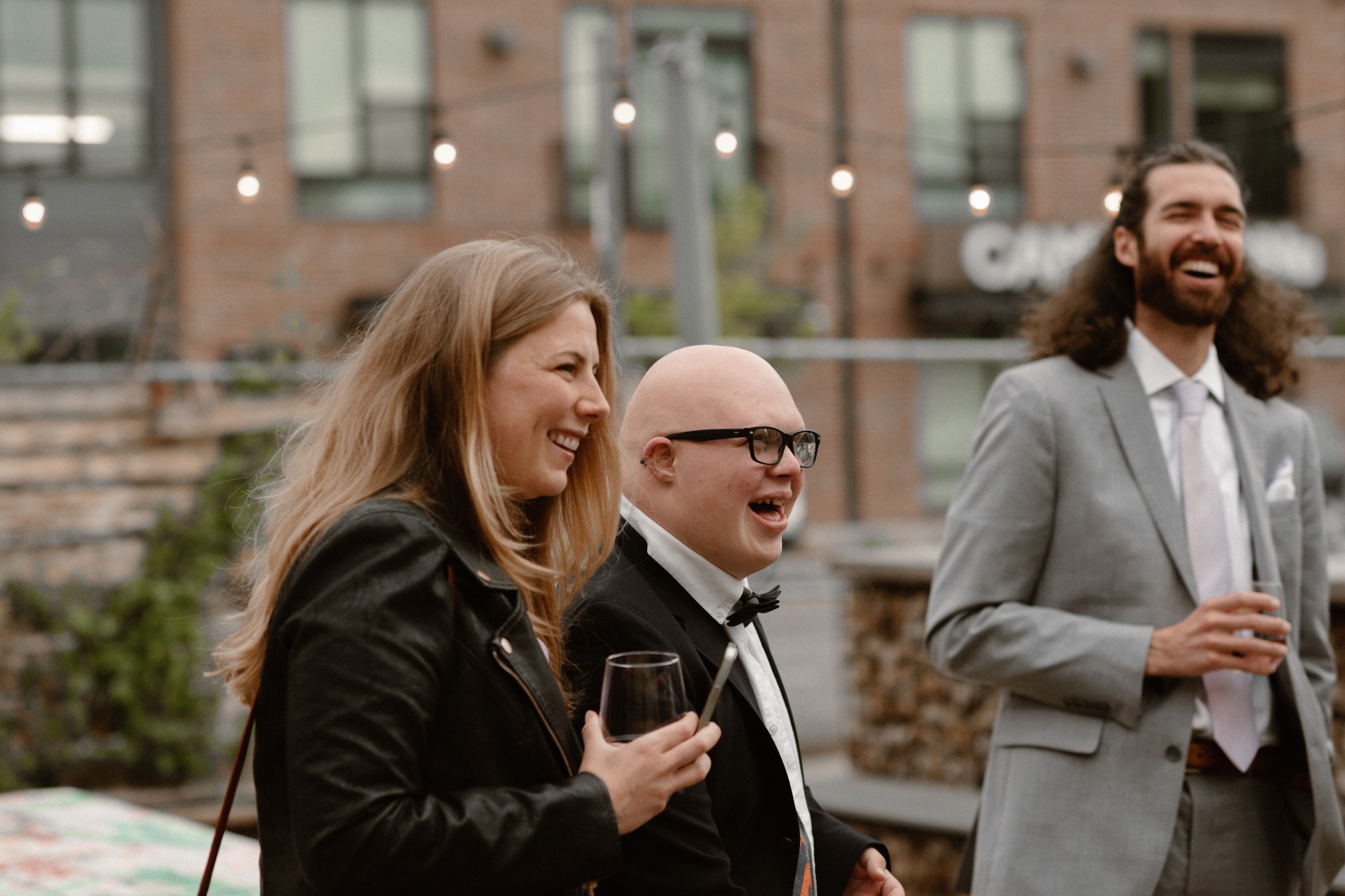 Wedding celebration at The Infinite Monkey Theorem in RiNo, Denver, Colorado. An intimate wedding celebration for Gwen and Alex, a year after their intimate elopement. Photos by Colorado wedding photographer, Ashley Joyce Photography.