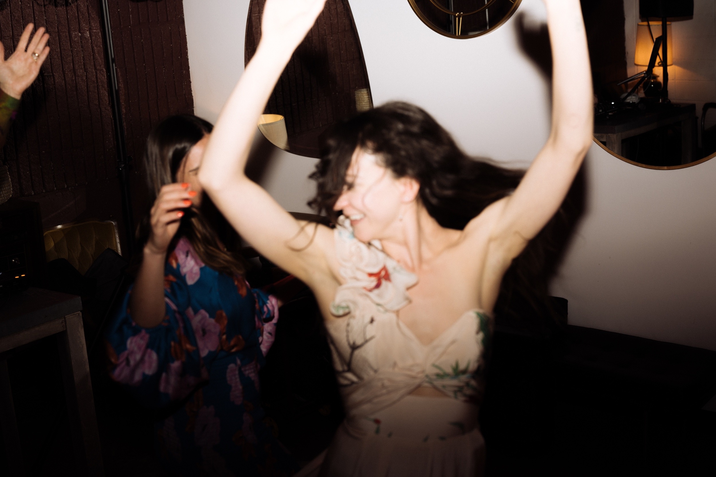 Wedding celebration at The Infinite Monkey Theorem in RiNo, Denver, Colorado. An intimate wedding celebration for Gwen and Alex, a year after their intimate elopement. Photos by Colorado wedding photographer, Ashley Joyce Photography.