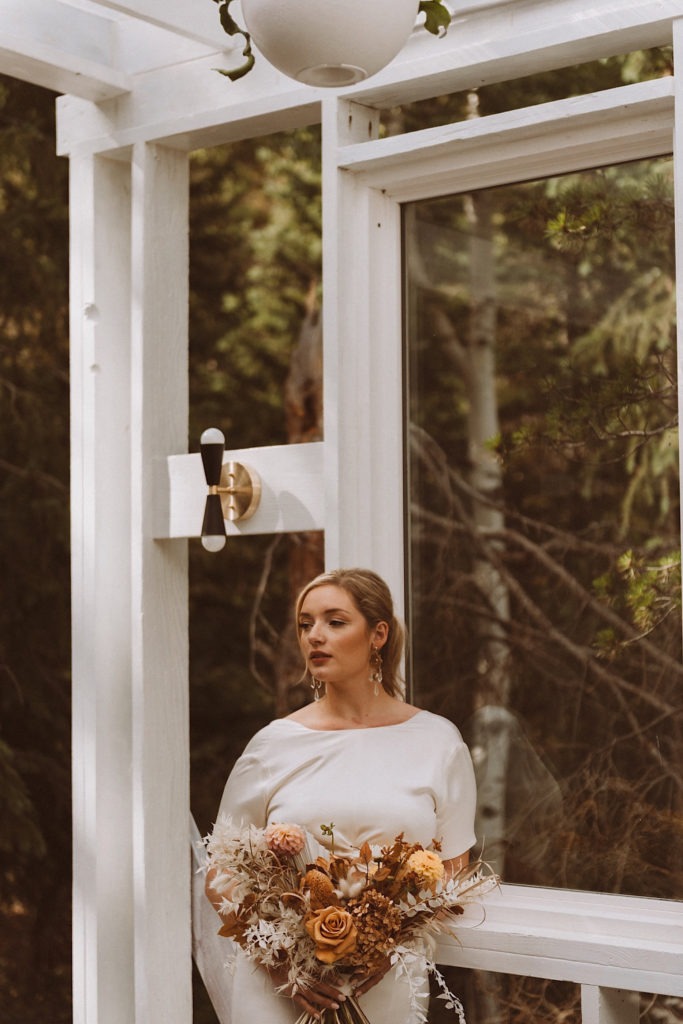 Bridal portraits | Lovely Bride Denver wedding dress | Prea James Bridal wedding dress | Elopement wedding photos in Colorado | Colorado wedding photos | Colorado elopement photos | Elopement at Treehaus, Colorado | Treehaus Colorado | Colorado elopement | Treehaus elopement | Colorado elopement venue | Colorado mountain elopement venue | Unique elopement venue | Elopement venue in Colorado | Ashley Joyce Photography 2020