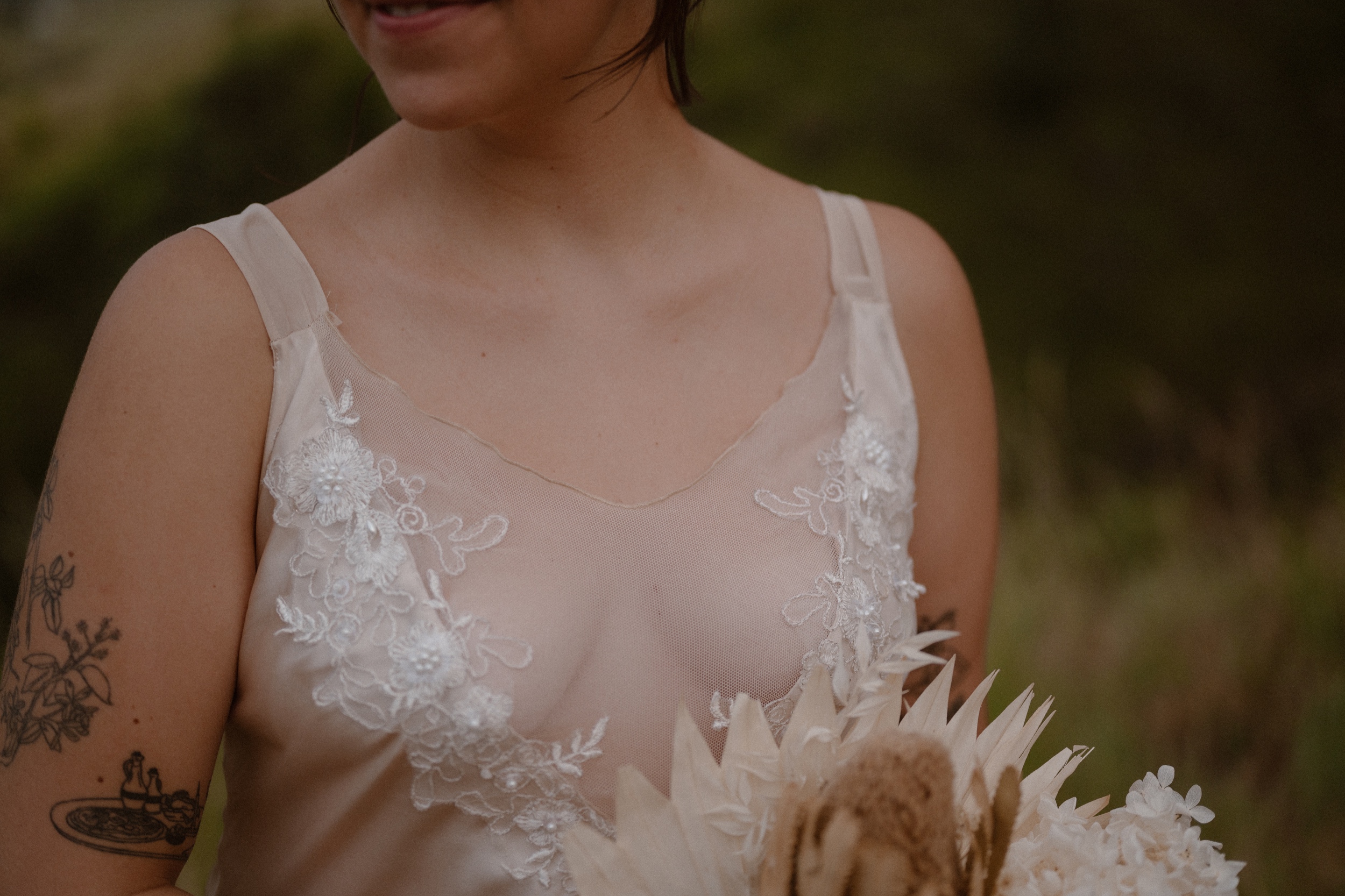 Colorado vow renewal in Morrison, Colorado. A Colorado married couple performs their vow renewal on a sunny summer day near Denver, Colorado. Photos by Denver elopement photographer, Ashley Joyce Photography, copyright 2022.