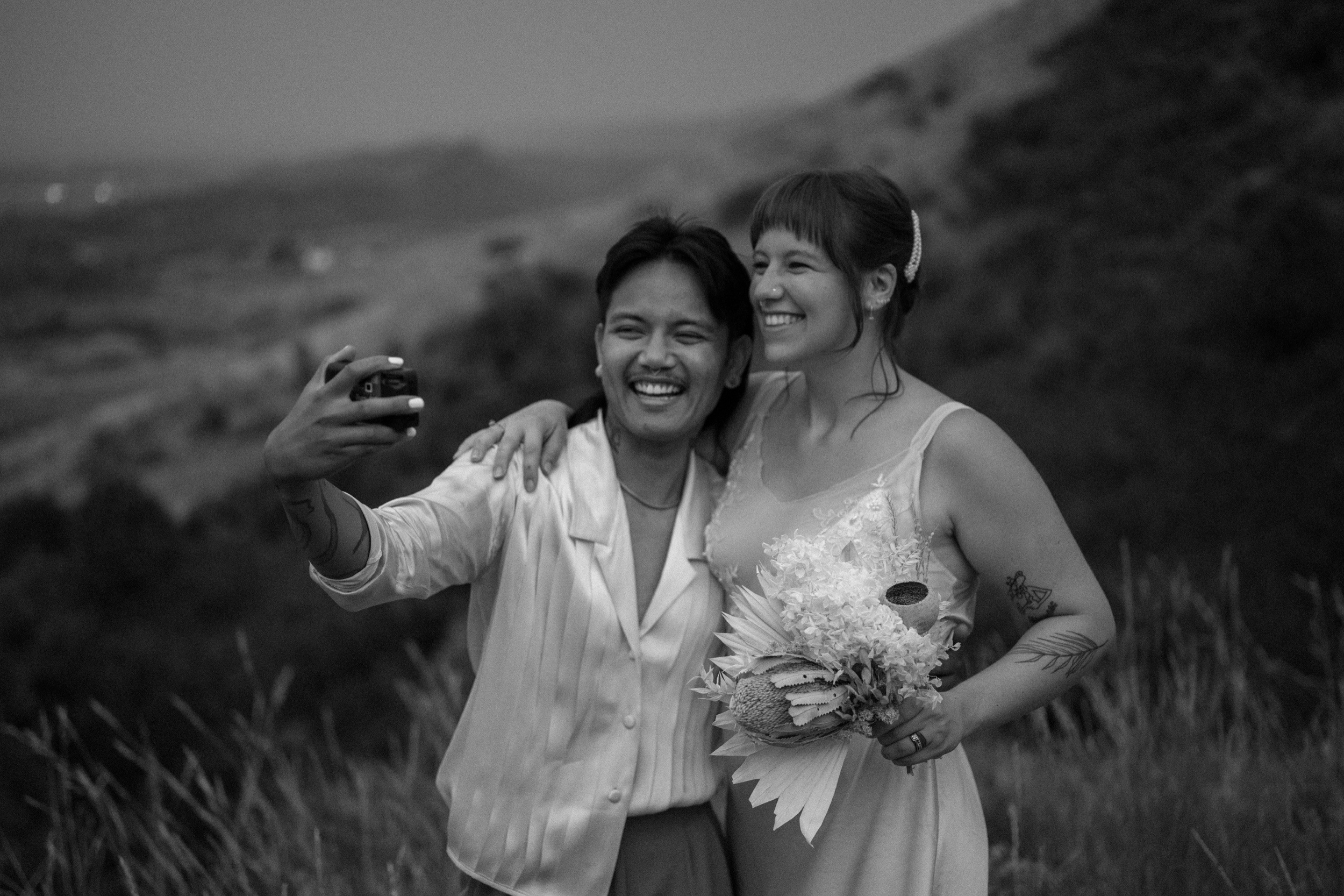 Colorado vow renewal in Morrison, Colorado. A Colorado married couple performs their vow renewal on a sunny summer day near Denver, Colorado. Photos by Denver elopement photographer, Ashley Joyce Photography, copyright 2022.