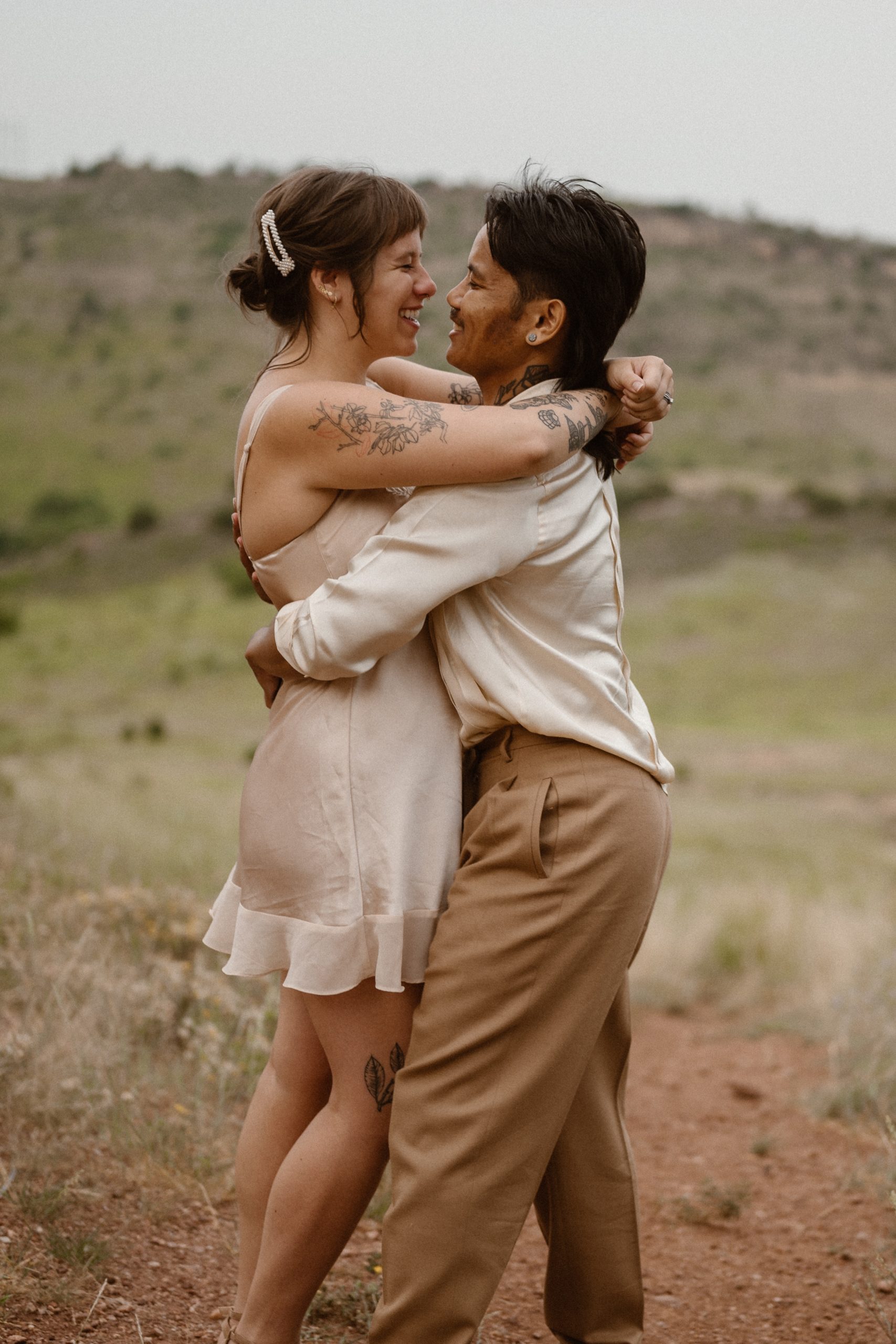 Colorado vow renewal in Morrison, Colorado. A Colorado married couple performs their vow renewal on a sunny summer day near Denver, Colorado. Photos by Denver elopement photographer, Ashley Joyce Photography, copyright 2022.