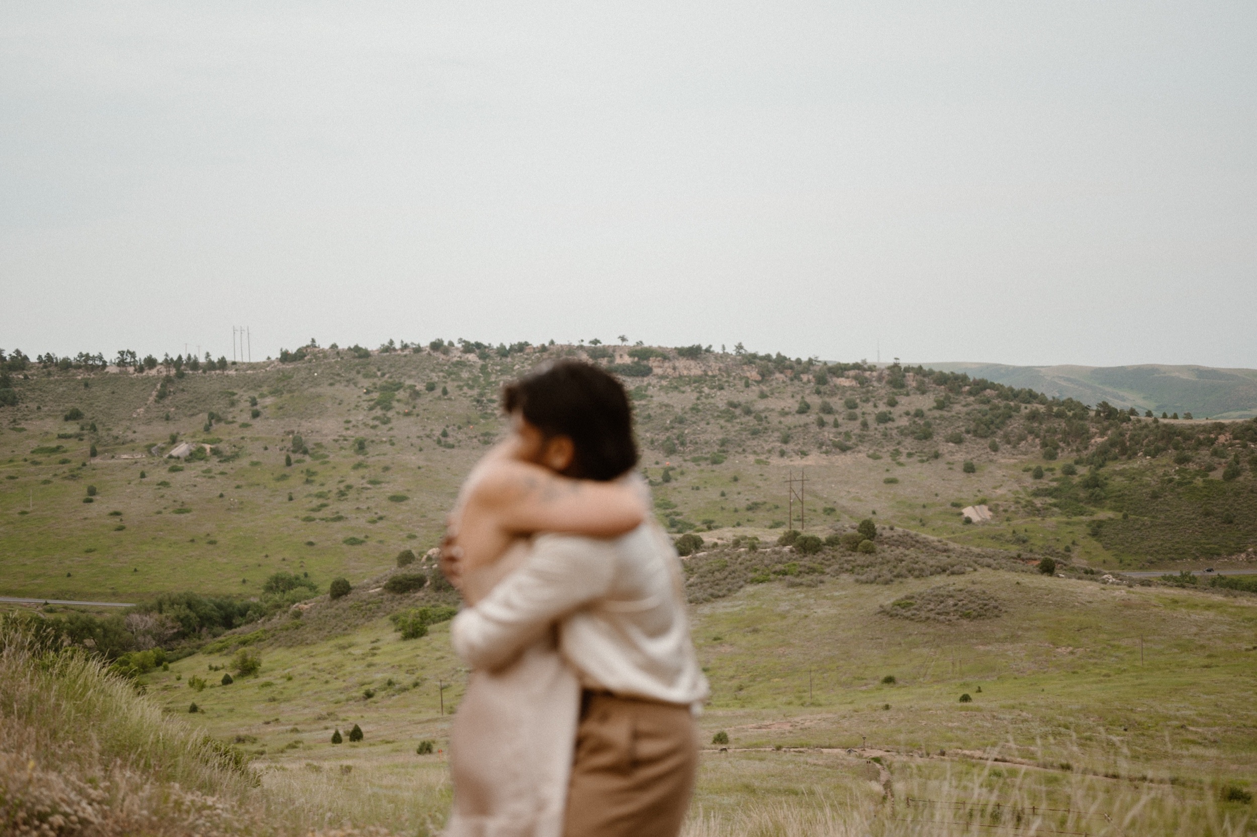 Colorado vow renewal in Morrison, Colorado. A Colorado married couple performs their vow renewal on a sunny summer day near Denver, Colorado. Photos by Denver elopement photographer, Ashley Joyce Photography, copyright 2022.