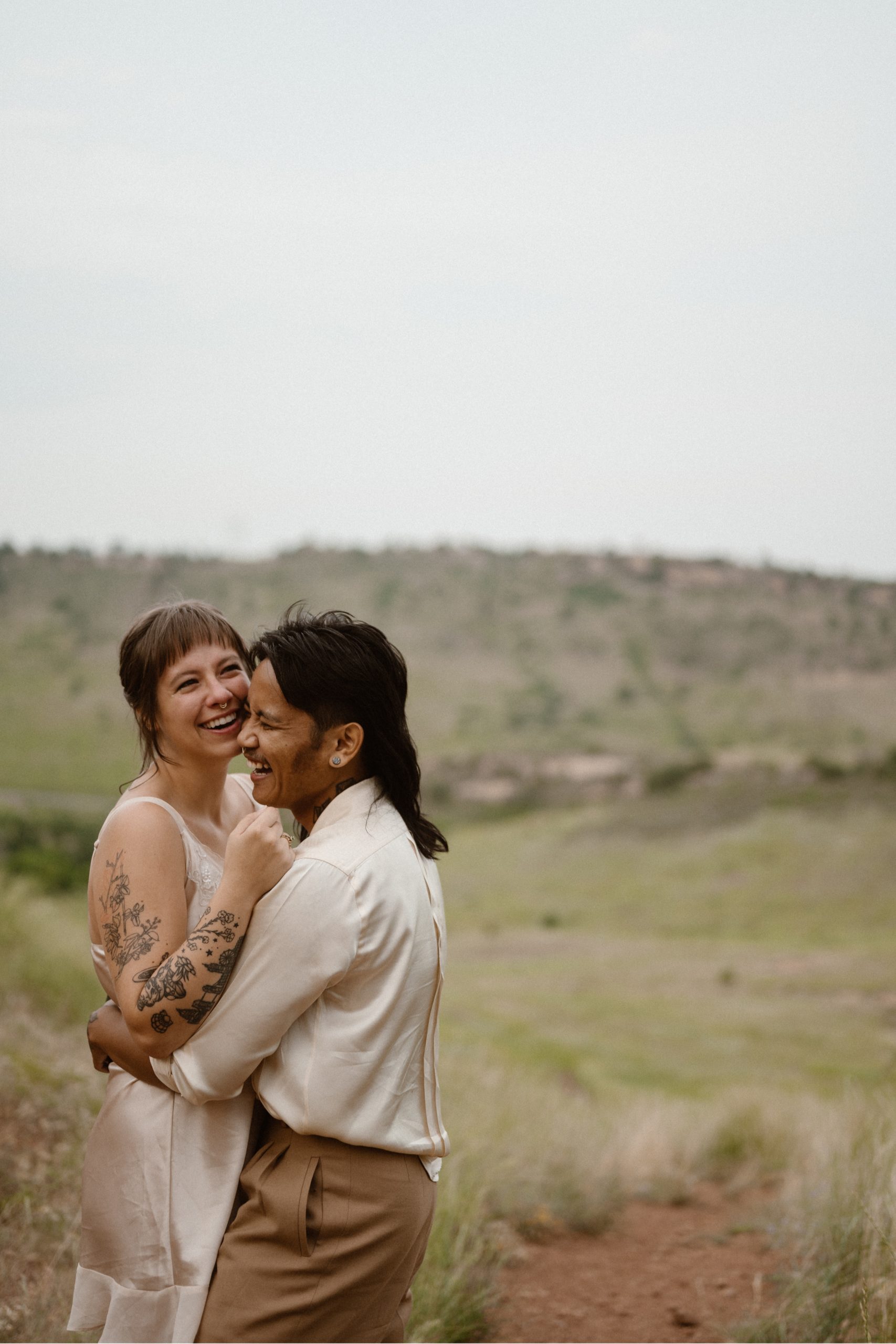 Colorado vow renewal in Morrison, Colorado. A Colorado married couple performs their vow renewal on a sunny summer day near Denver, Colorado. Photos by Denver elopement photographer, Ashley Joyce Photography, copyright 2022.