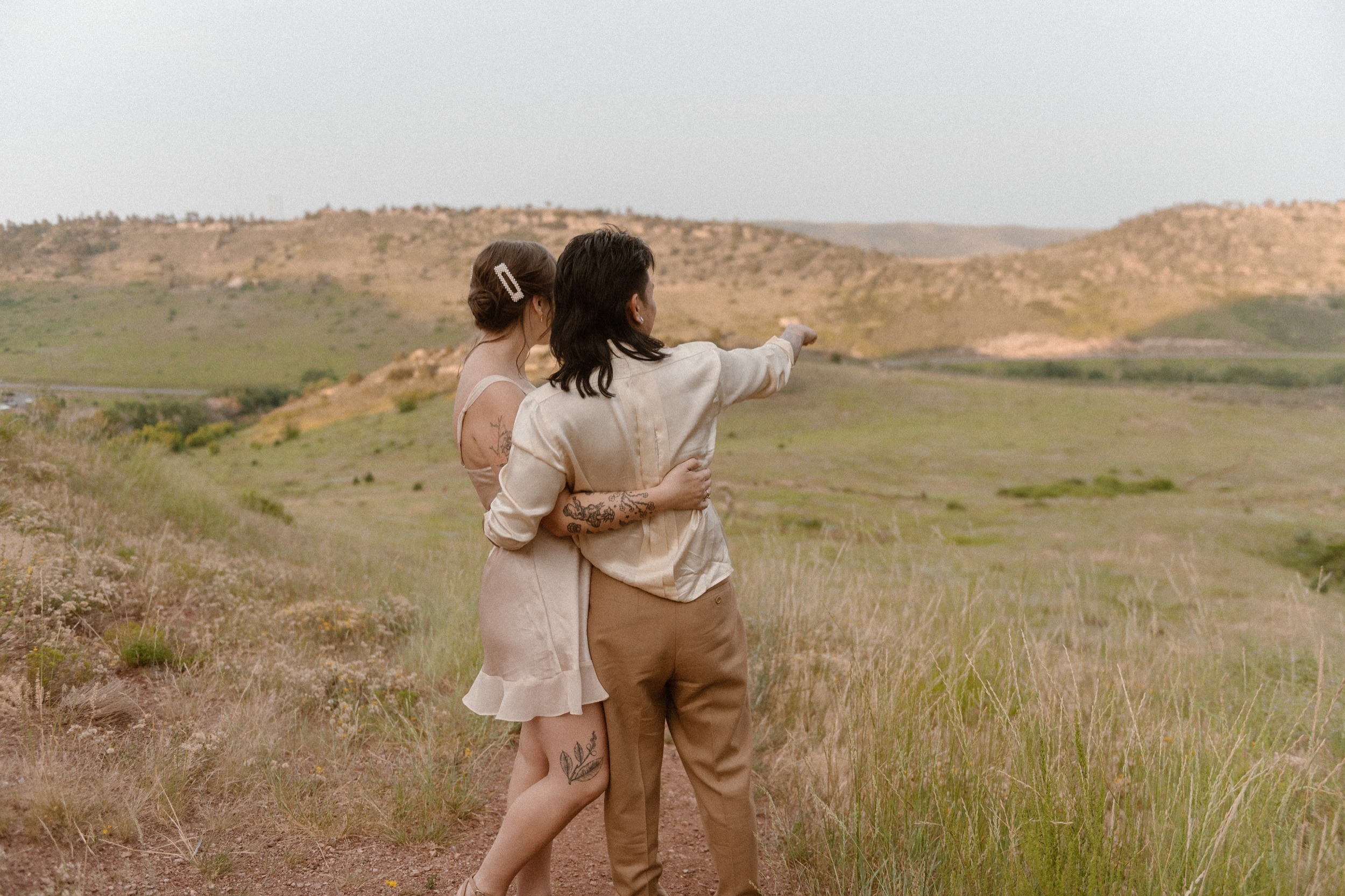 Colorado vow renewal in Morrison, Colorado. A Colorado married couple performs their vow renewal on a sunny summer day near Denver, Colorado. Photos by Denver elopement photographer, Ashley Joyce Photography, copyright 2022.