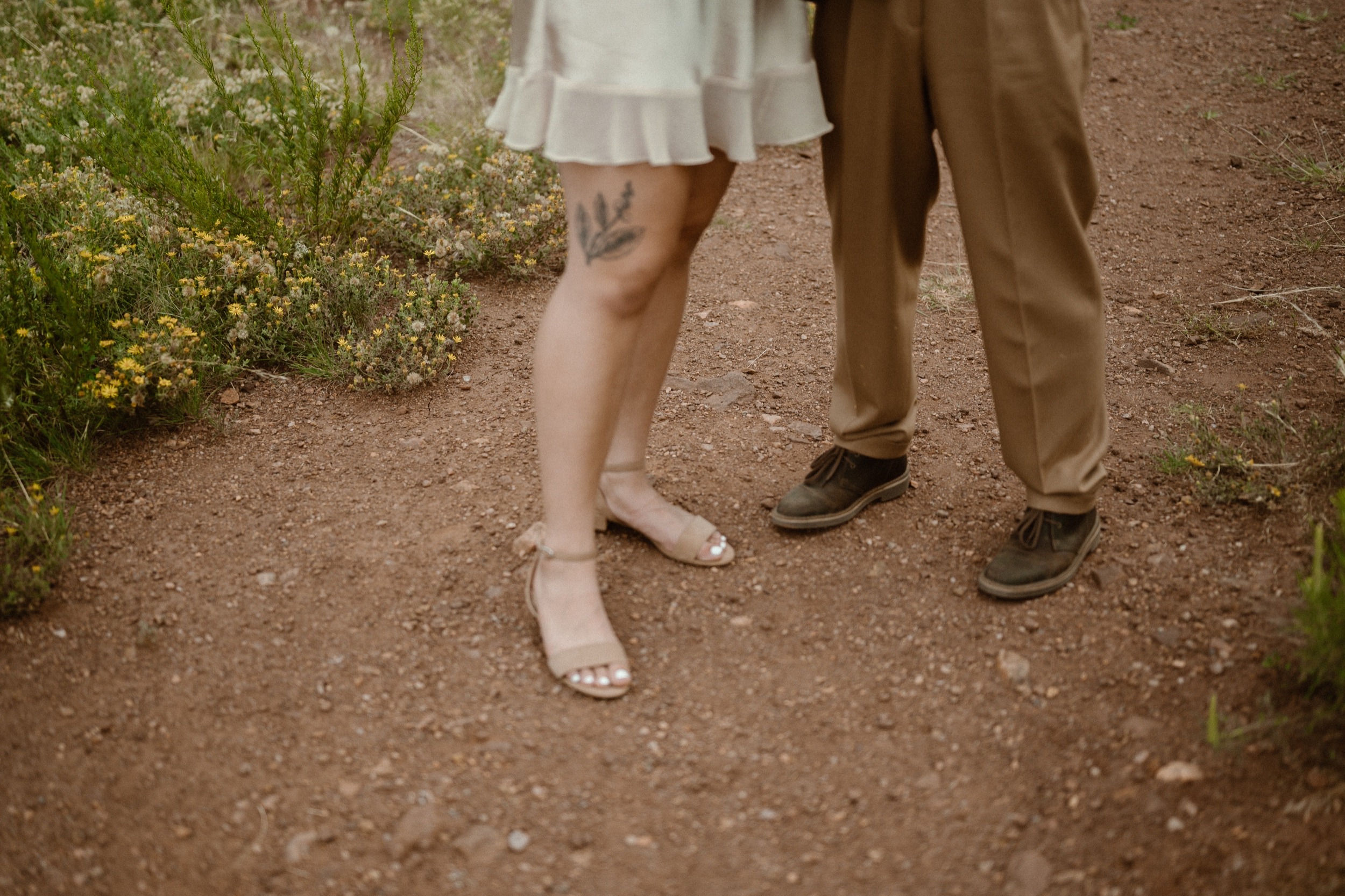 Colorado vow renewal in Morrison, Colorado. A Colorado married couple performs their vow renewal on a sunny summer day near Denver, Colorado. Photos by Denver elopement photographer, Ashley Joyce Photography, copyright 2022.