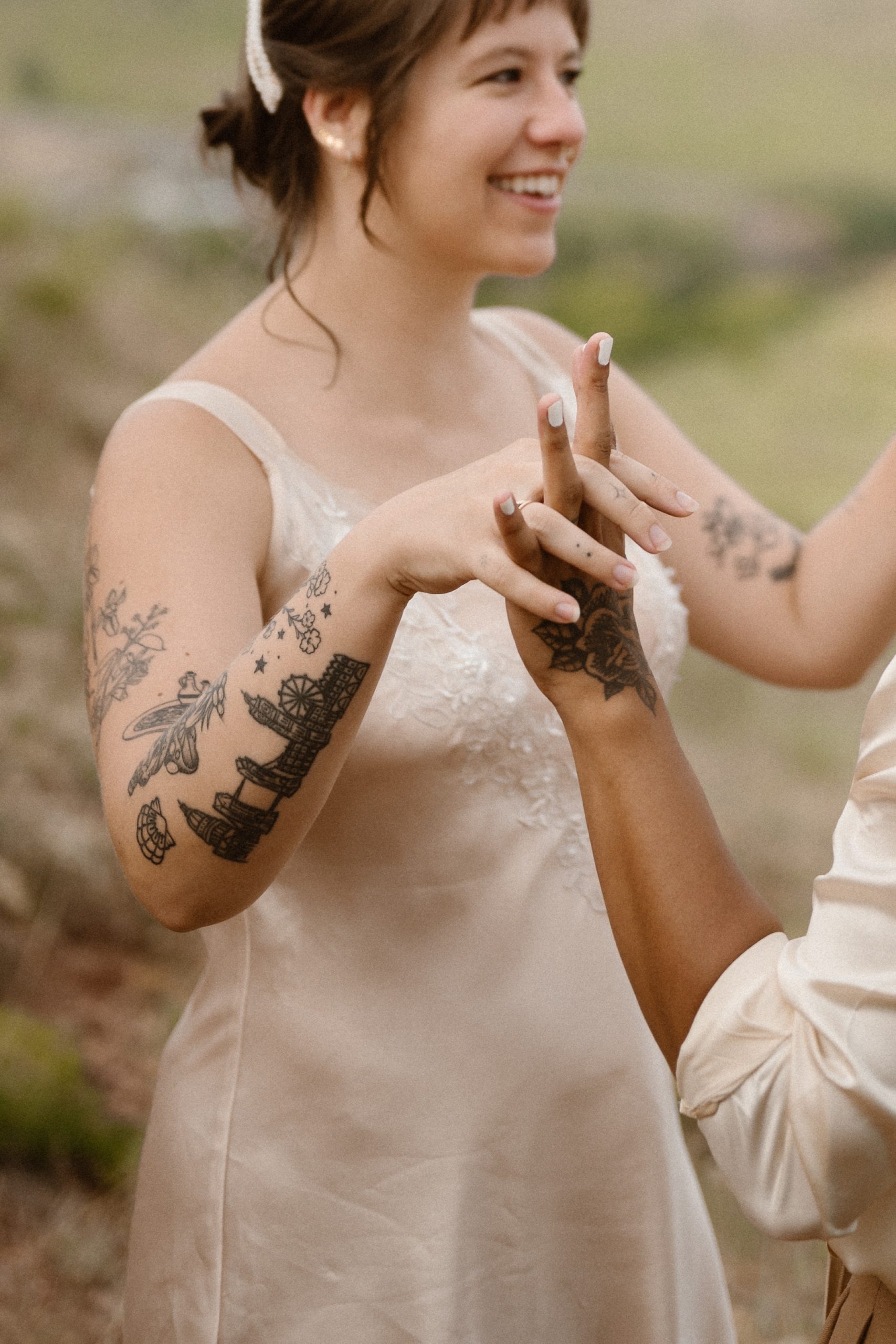 Colorado vow renewal in Morrison, Colorado. A Colorado married couple performs their vow renewal on a sunny summer day near Denver, Colorado. Photos by Denver elopement photographer, Ashley Joyce Photography, copyright 2022.
