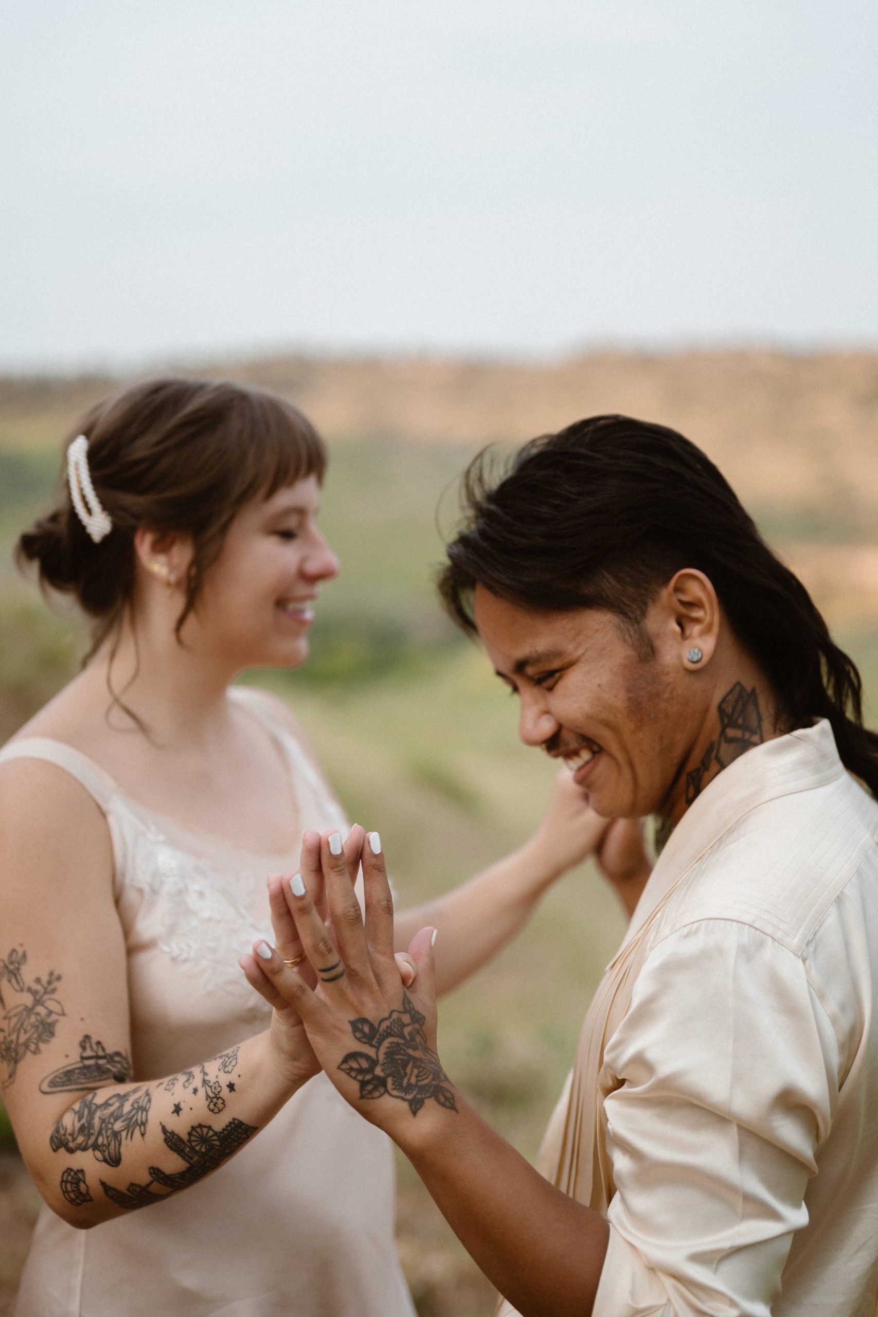 Colorado vow renewal in Morrison, Colorado. A Colorado married couple performs their vow renewal on a sunny summer day near Denver, Colorado. Photos by Denver elopement photographer, Ashley Joyce Photography, copyright 2022.