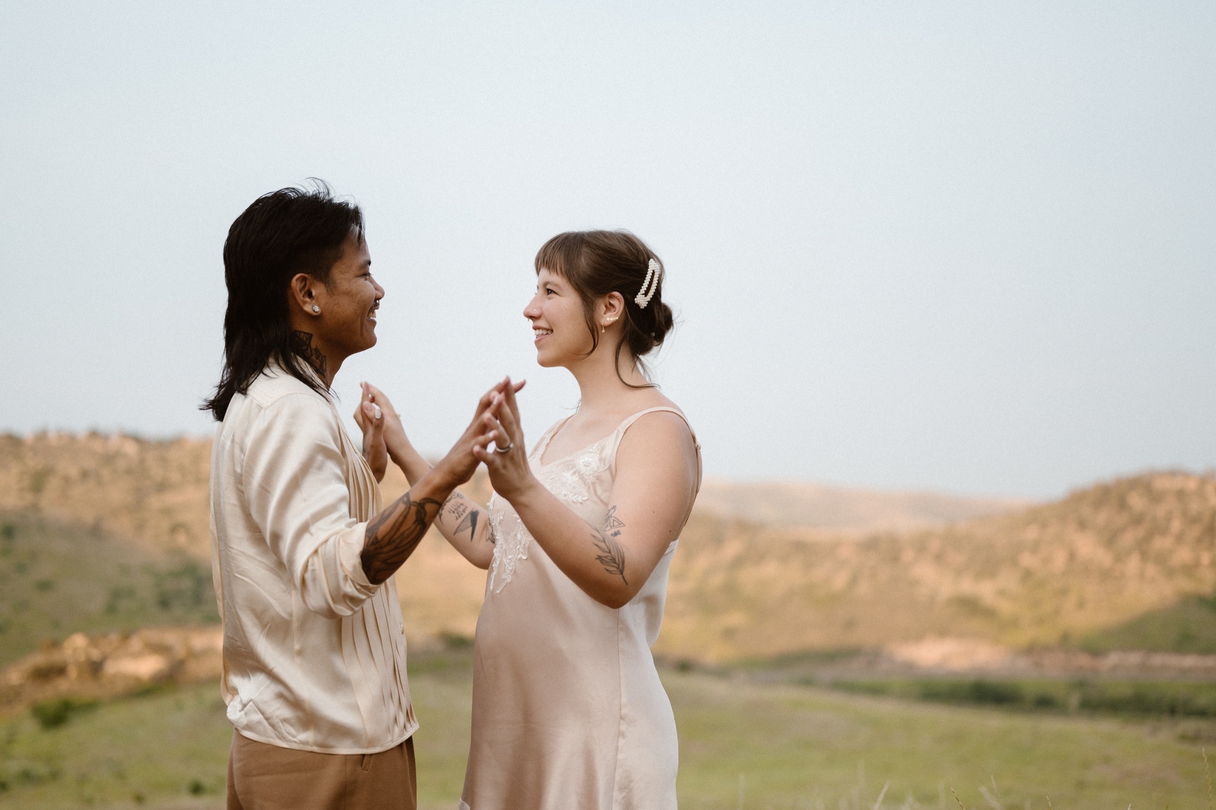 Colorado vow renewal in Morrison, Colorado. A Colorado married couple performs their vow renewal on a sunny summer day near Denver, Colorado. Photos by Denver elopement photographer, Ashley Joyce Photography, copyright 2022.