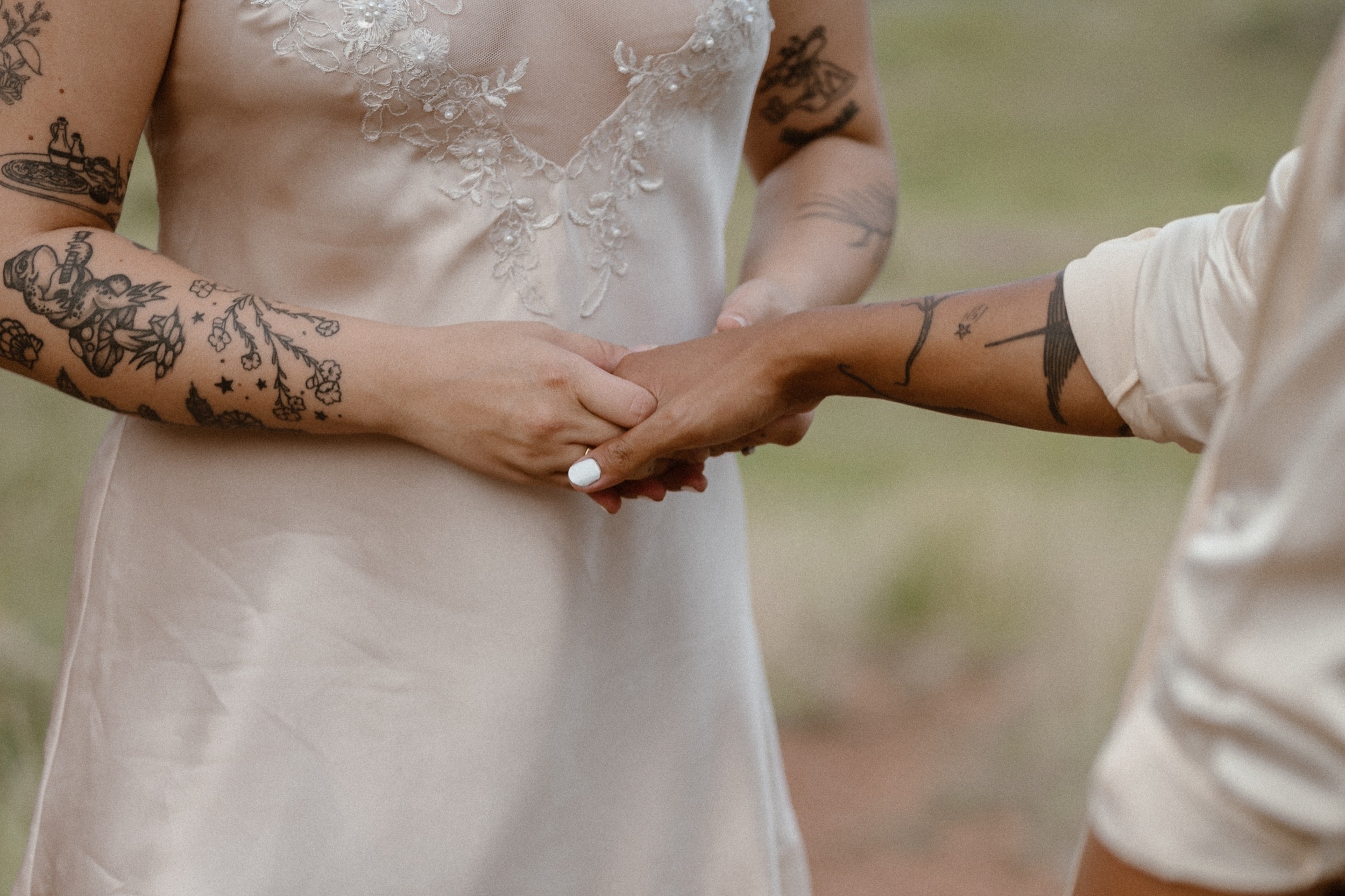 Colorado vow renewal in Morrison, Colorado. A Colorado married couple performs their vow renewal on a sunny summer day near Denver, Colorado. Photos by Denver elopement photographer, Ashley Joyce Photography, copyright 2022.
