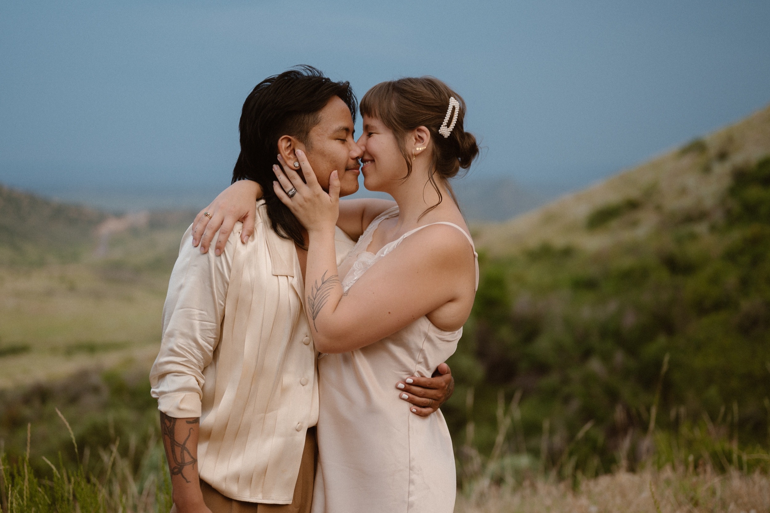 Colorado vow renewal in Morrison, Colorado. A Colorado married couple performs their vow renewal on a sunny summer day near Denver, Colorado. Photos by Denver elopement photographer, Ashley Joyce Photography, copyright 2022.