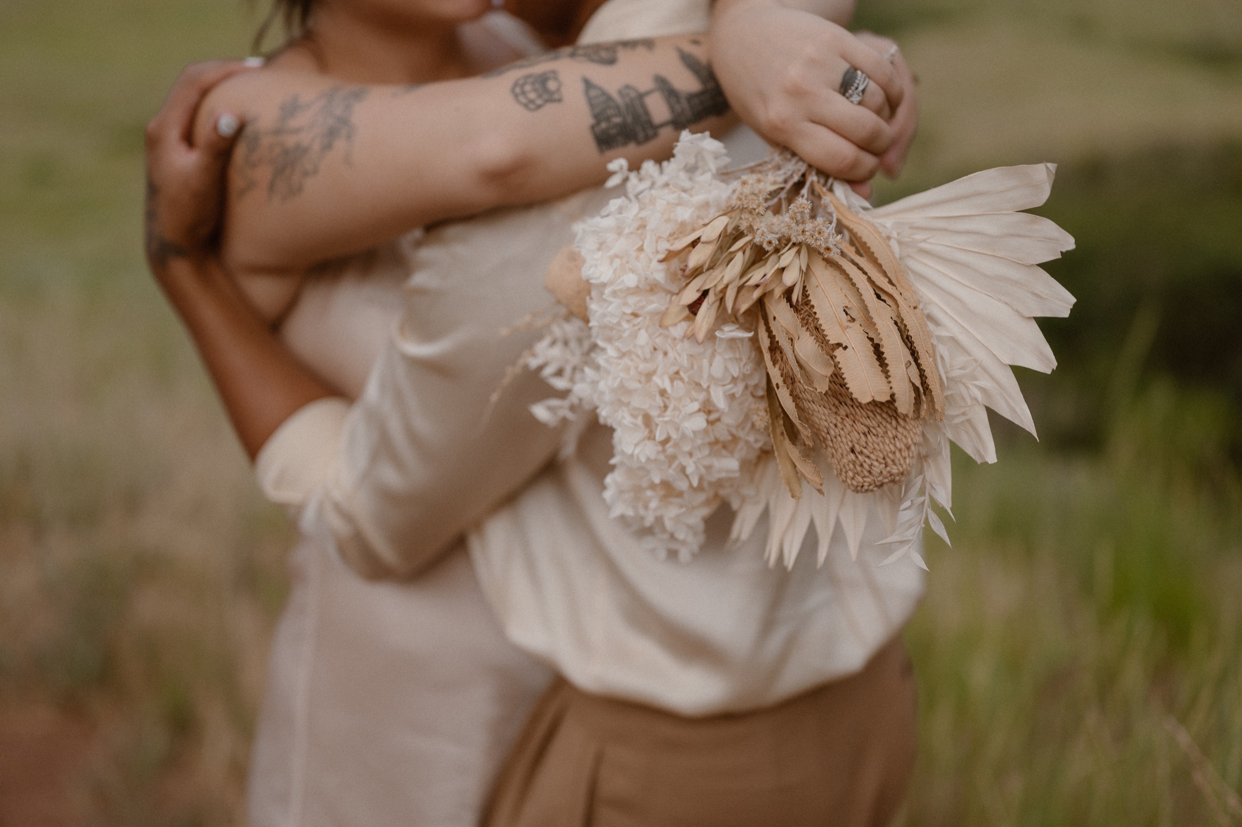 Colorado vow renewal in Morrison, Colorado. A Colorado married couple performs their vow renewal on a sunny summer day near Denver, Colorado. Photos by Denver elopement photographer, Ashley Joyce Photography, copyright 2022.
