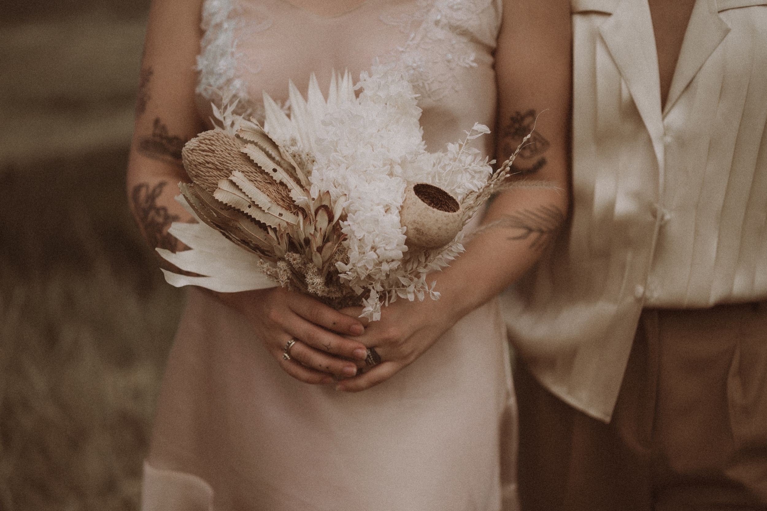 Colorado vow renewal in Morrison, Colorado. A Colorado married couple performs their vow renewal on a sunny summer day near Denver, Colorado. Photos by Denver elopement photographer, Ashley Joyce Photography, copyright 2022.