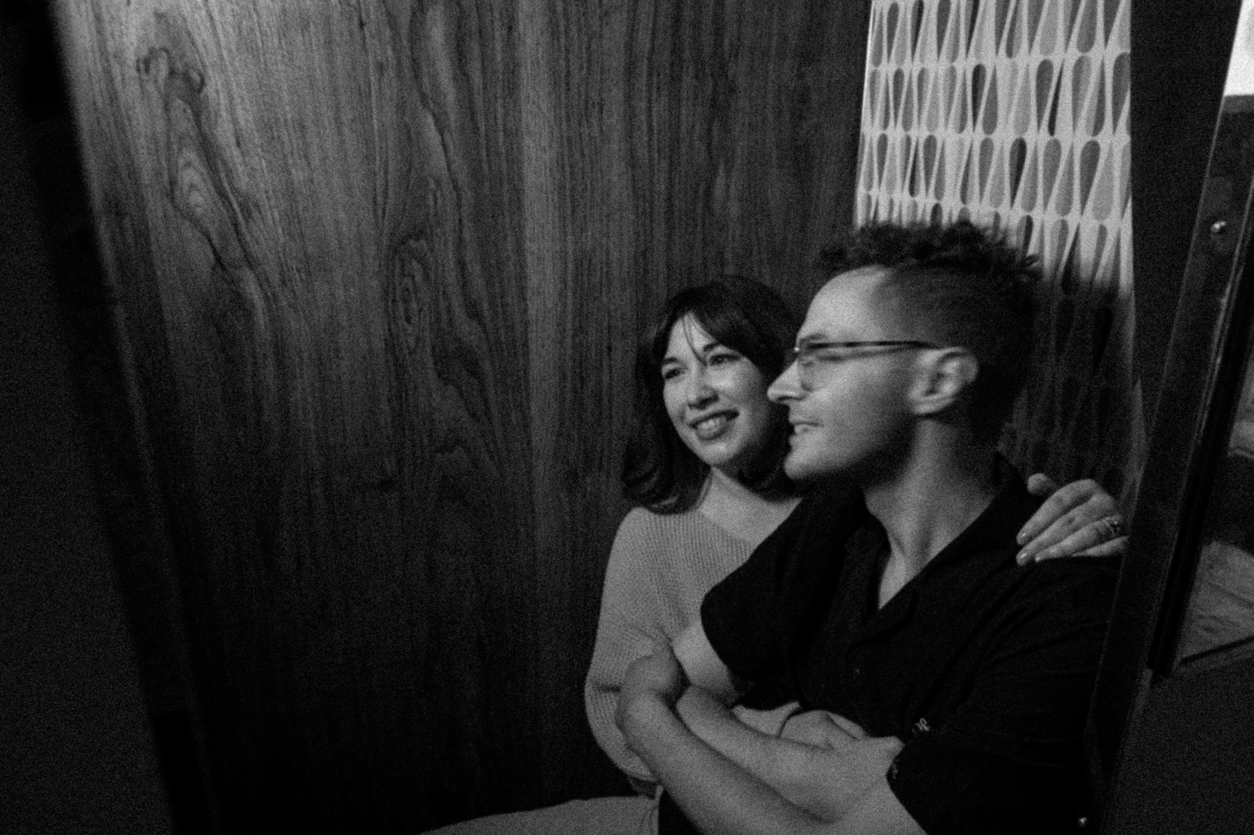 A fun downtown Denver engagement session at a bar. Sputnik, Denver bar engagement photos. Colorado engagement photos by Ashley Joyce Photography