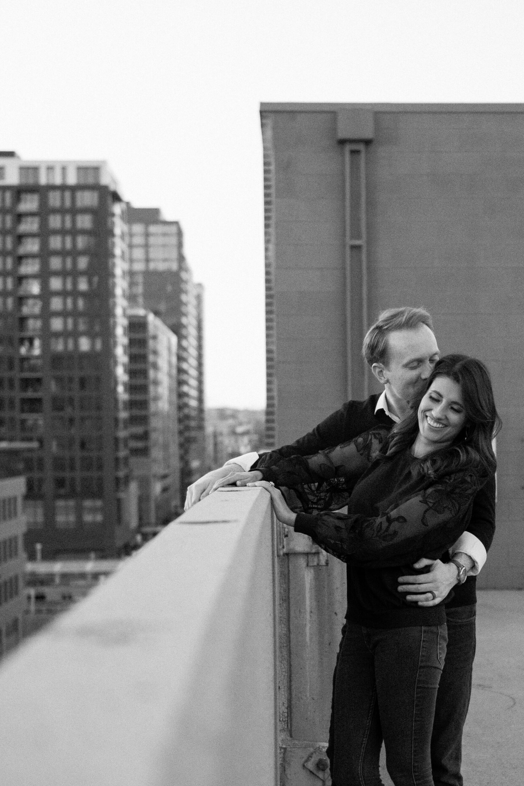 A romantic downtown Denver engagement session that took place on top of a parking garage, inside the elegant bar Poka Lola, and inside the historic Union Station. Photos by Colorado wedding photographer Ashley Joyce.