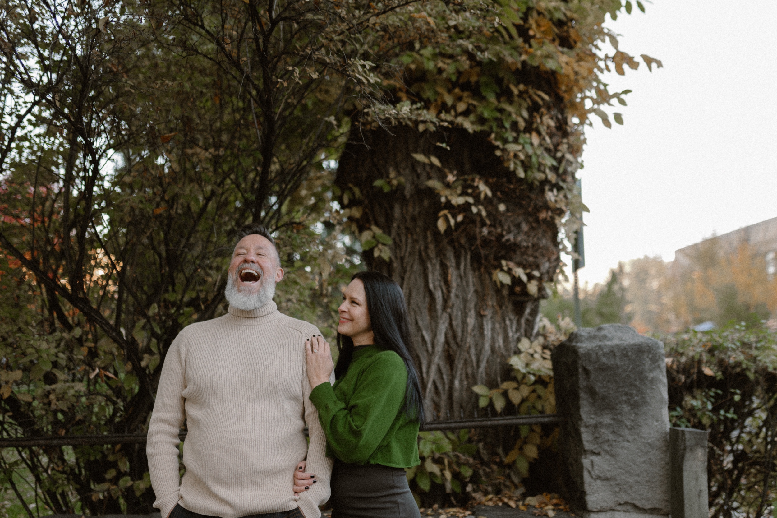 A color photo of an engaged couple posing together for their Durango Colorado engagement session, taken by Colorado wedding photographer, Ashley Joyce.