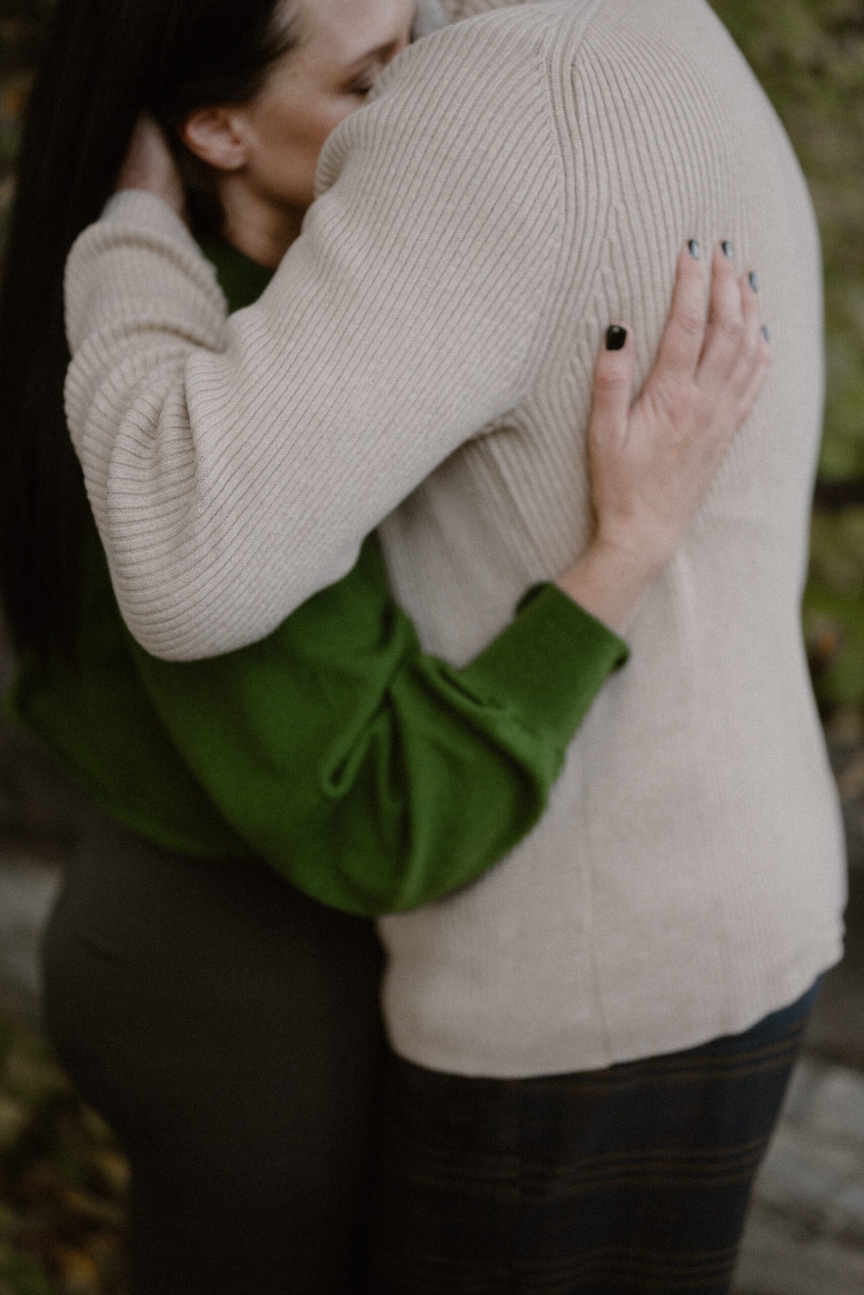 A color photo of an engaged couple intimate embracing one another for their Durango Colorado engagement session, taken by Colorado wedding photographer, Ashley Joyce.