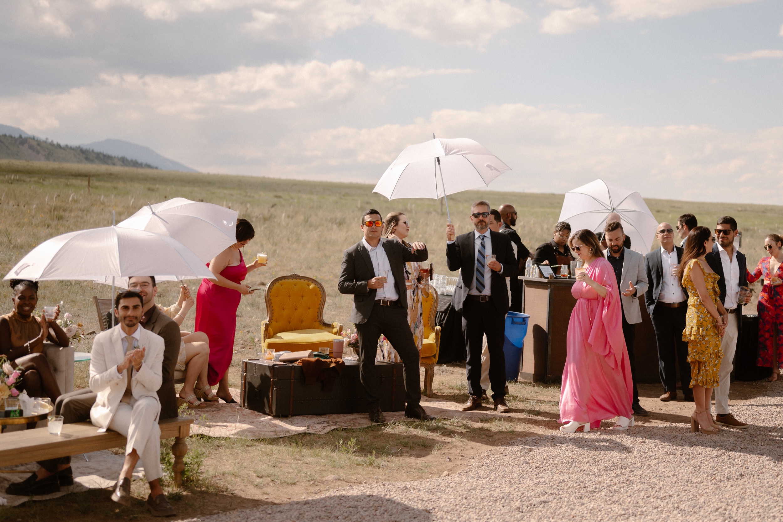 Wedding guests at a Three Peaks Ranch wedding. Photo by Colorado wedding photographer Ashley Joyce.