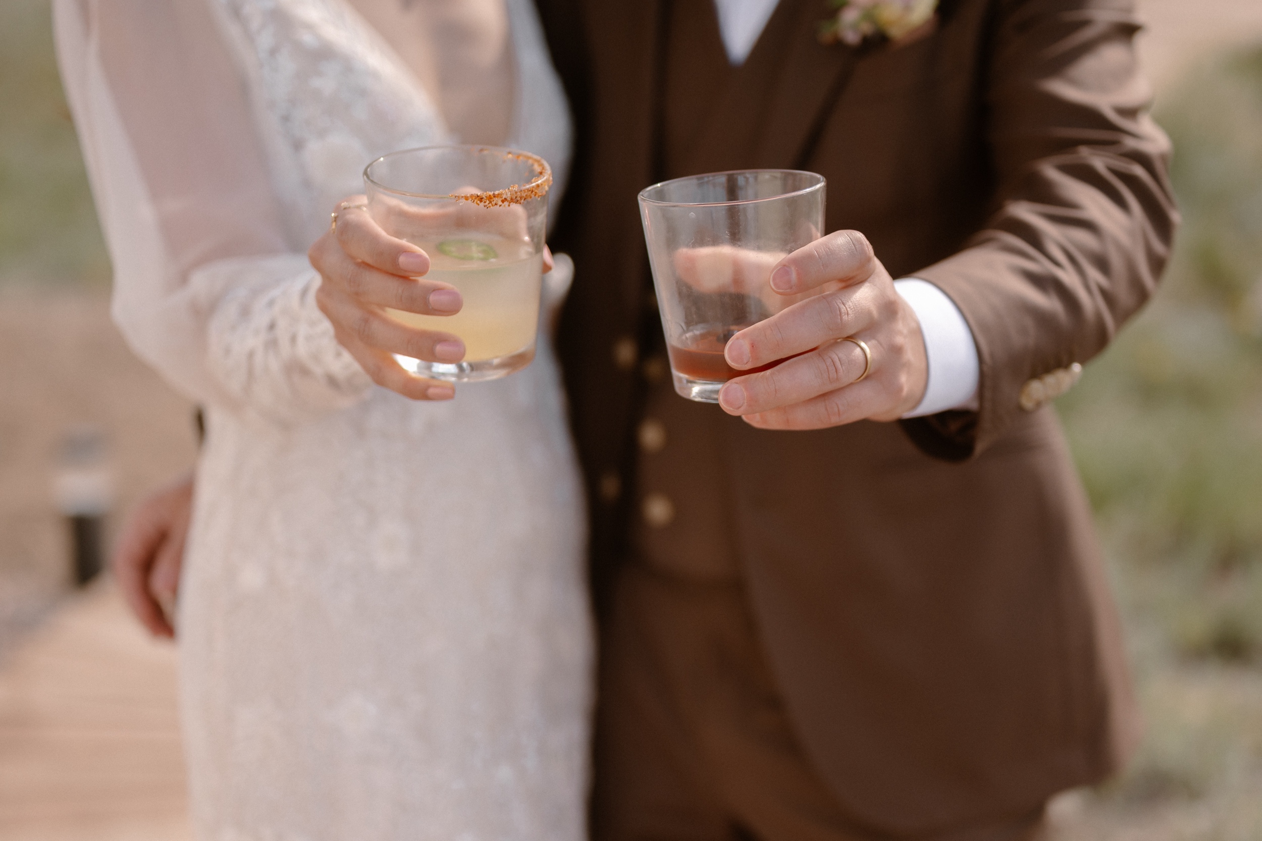 A closeup of specialty cocktails at a wedding. Photo by Colorado wedding photographer Ashley Joyce.