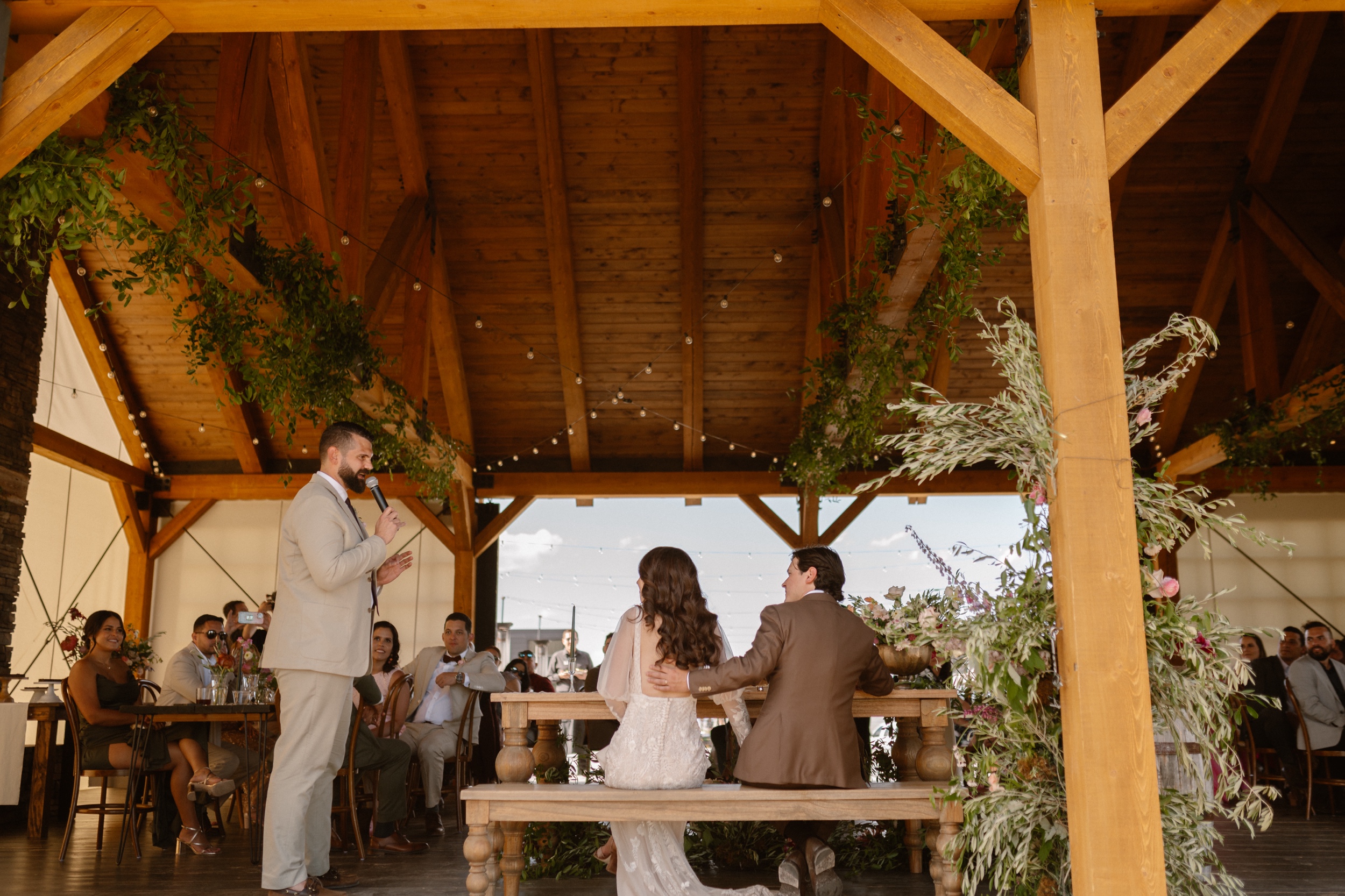 A lively wedding reception that took place at Three Peaks Ranch. Photo by Colorado wedding photographer Ashley Joyce.