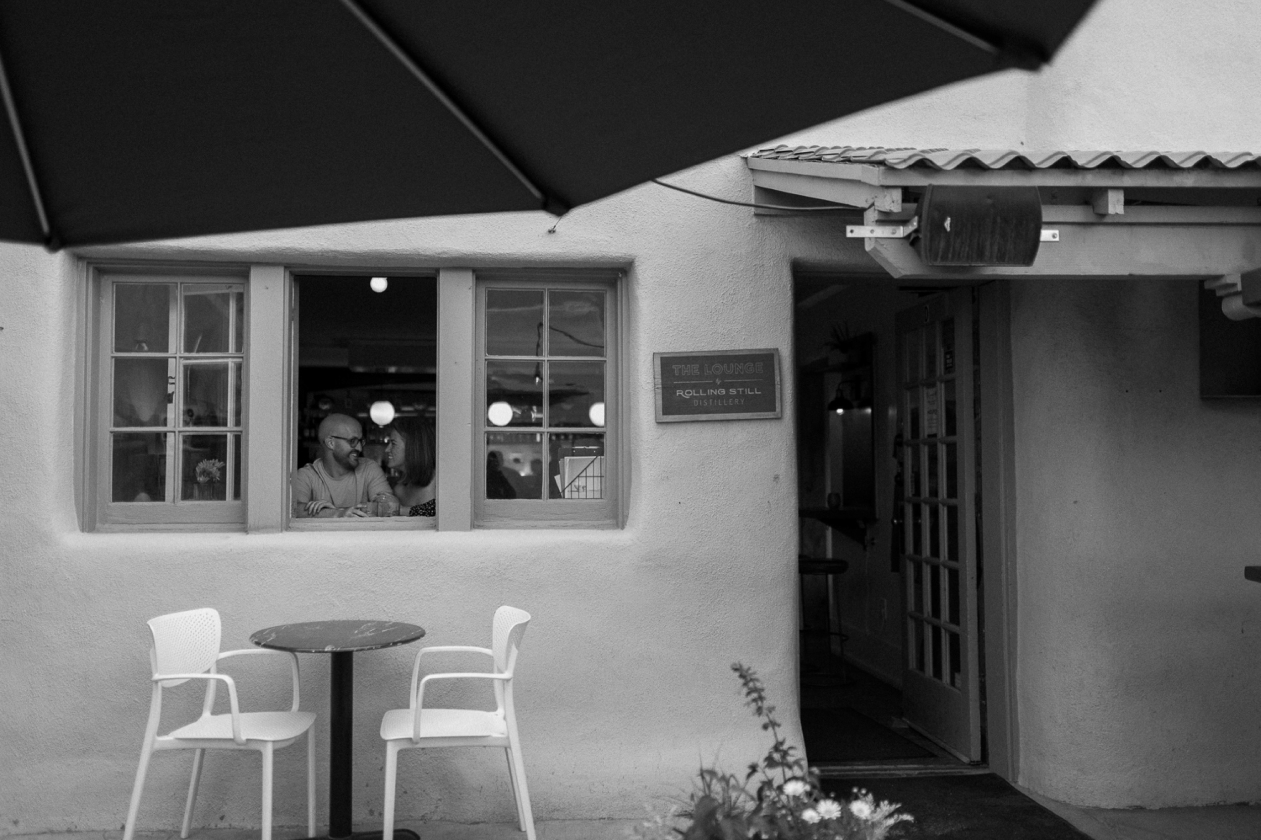 Engagement photos taken in downtown Taos, New Mexico. Photos by Telluride wedding photographer Ashley Joyce Photography.