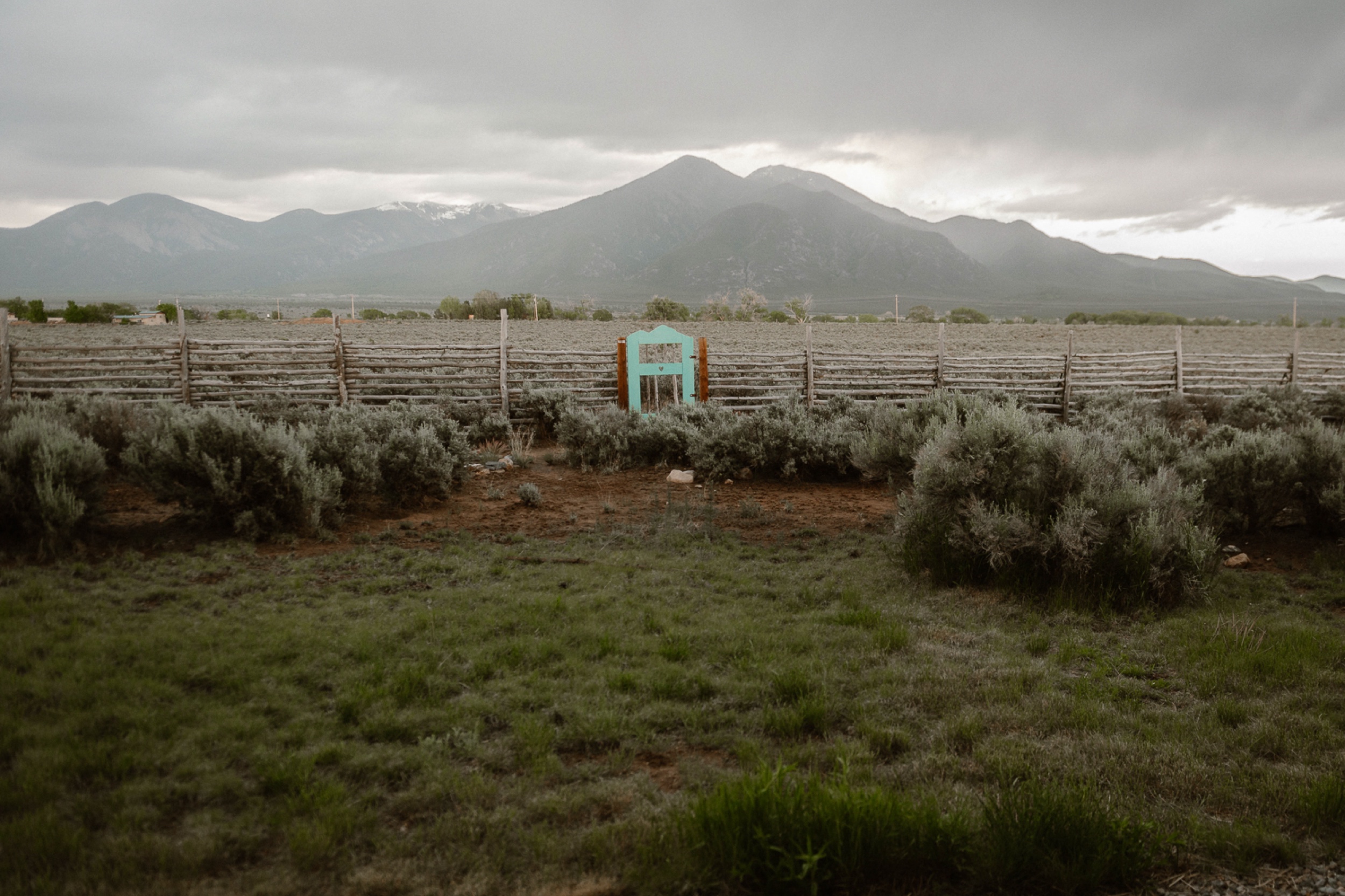 Engagement photos taken in downtown Taos, New Mexico. Photos by Telluride wedding photographer Ashley Joyce Photography.