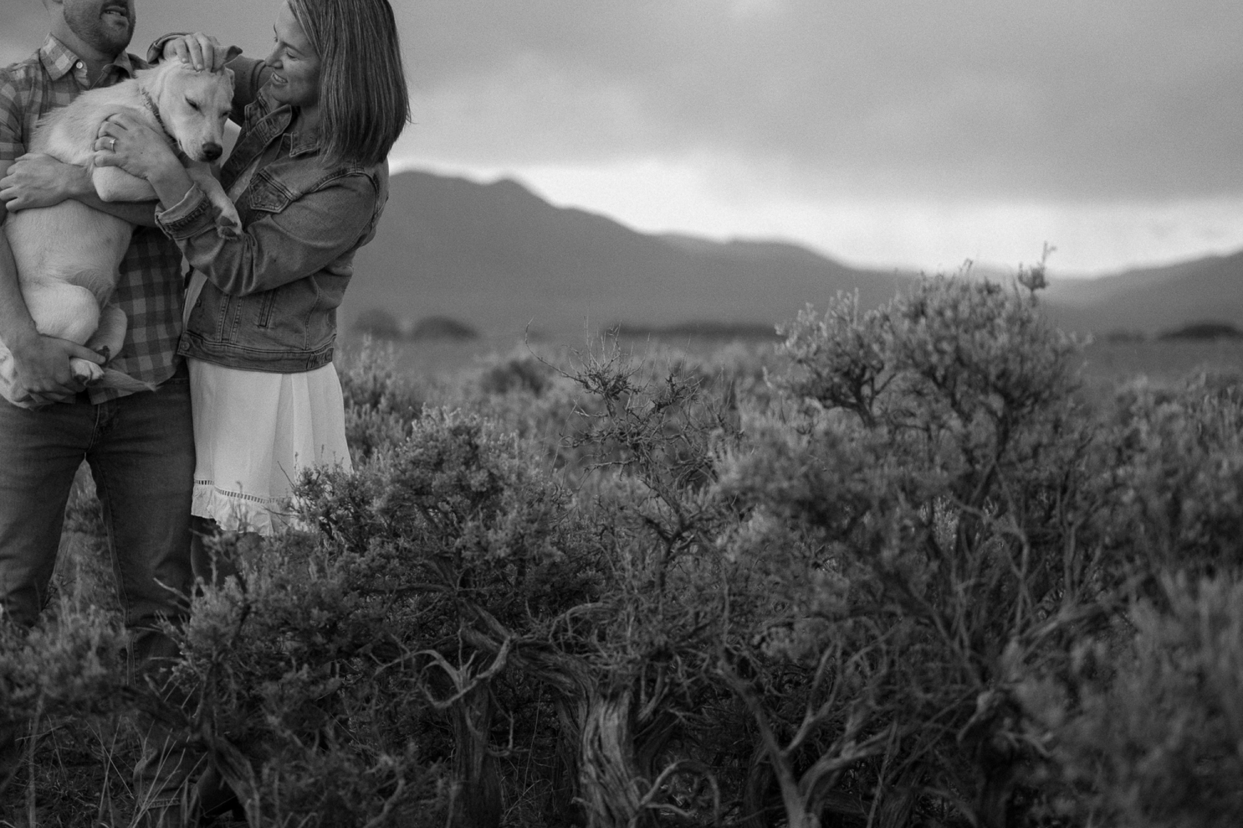 Engagement photos taken in downtown Taos, New Mexico. Photos by Telluride wedding photographer Ashley Joyce Photography.