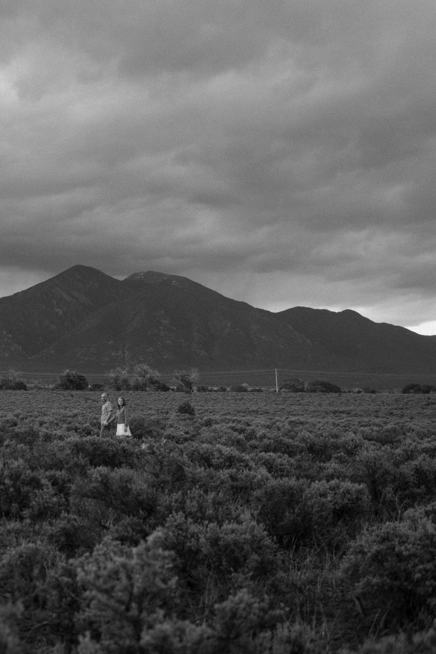 Engagement photos taken in downtown Taos, New Mexico. Photos by Telluride wedding photographer Ashley Joyce Photography.