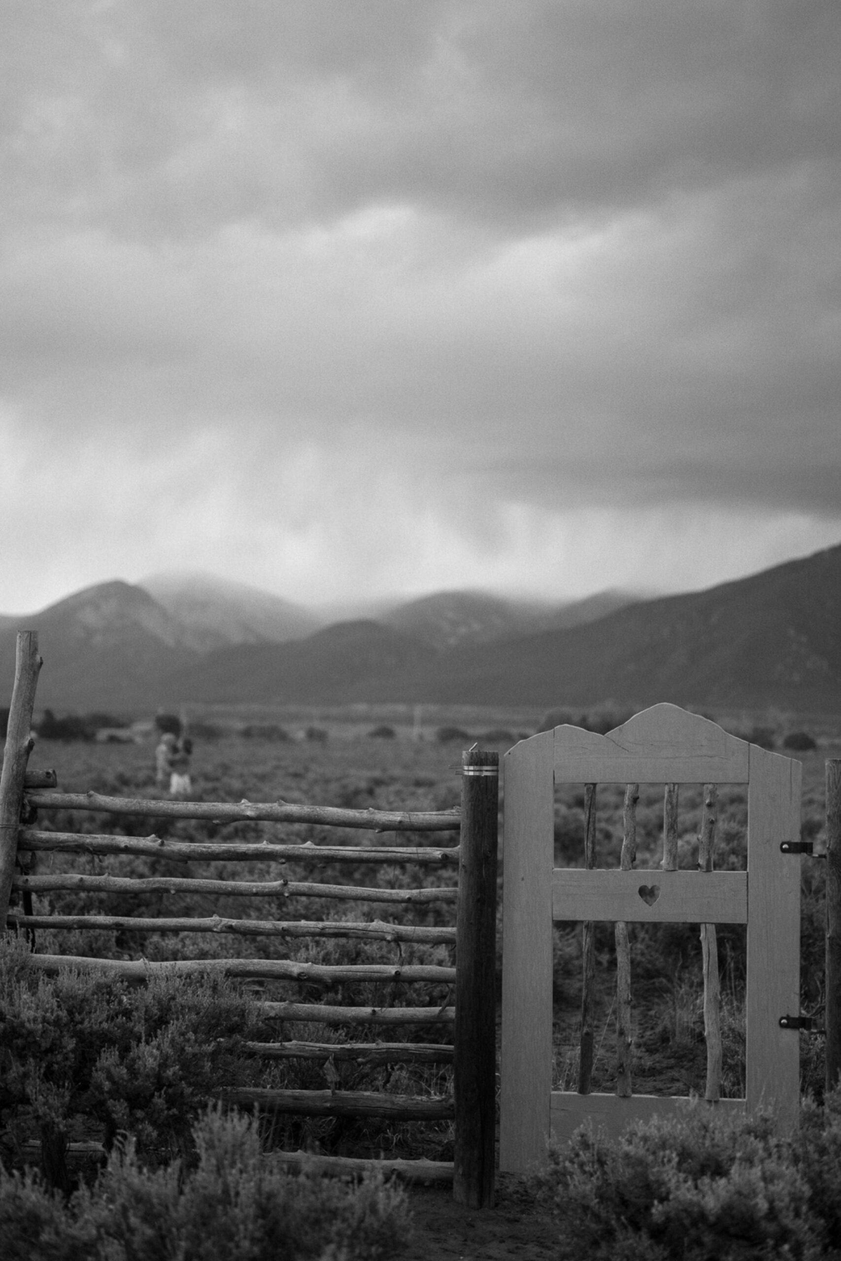 Engagement photos taken in downtown Taos, New Mexico. Photos by Telluride wedding photographer Ashley Joyce Photography.