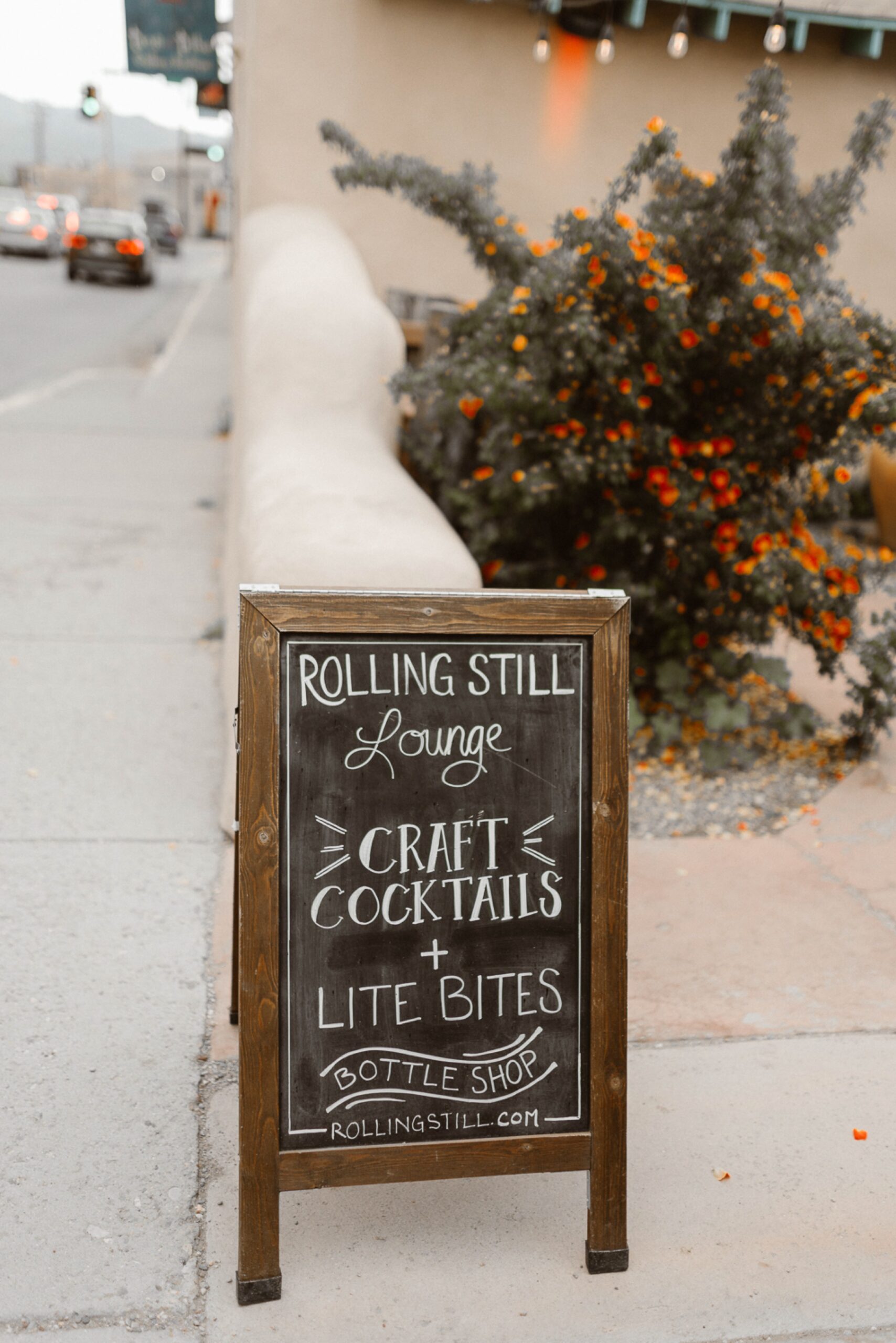 Engagement photos taken in downtown Taos, New Mexico. Photos by Telluride wedding photographer Ashley Joyce Photography.