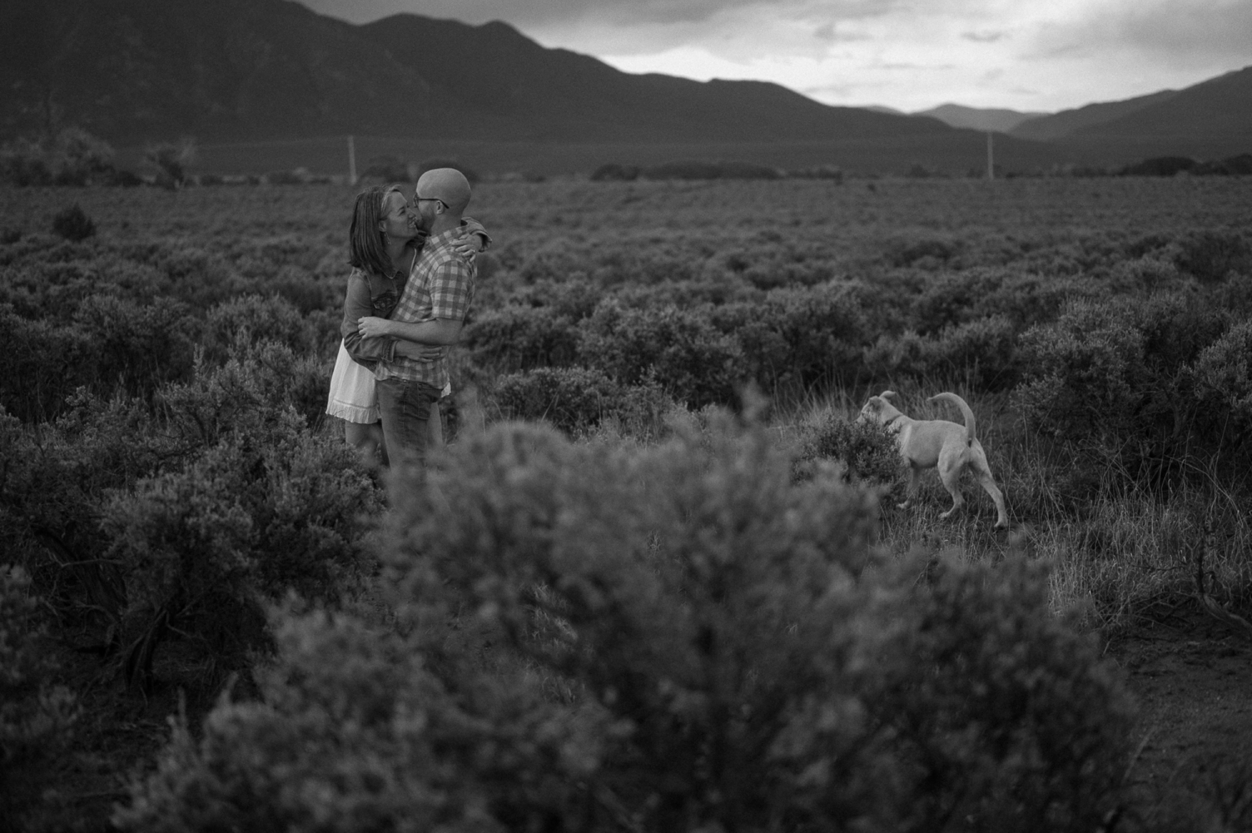 Engagement photos taken in downtown Taos, New Mexico. Photos by Telluride wedding photographer Ashley Joyce Photography.