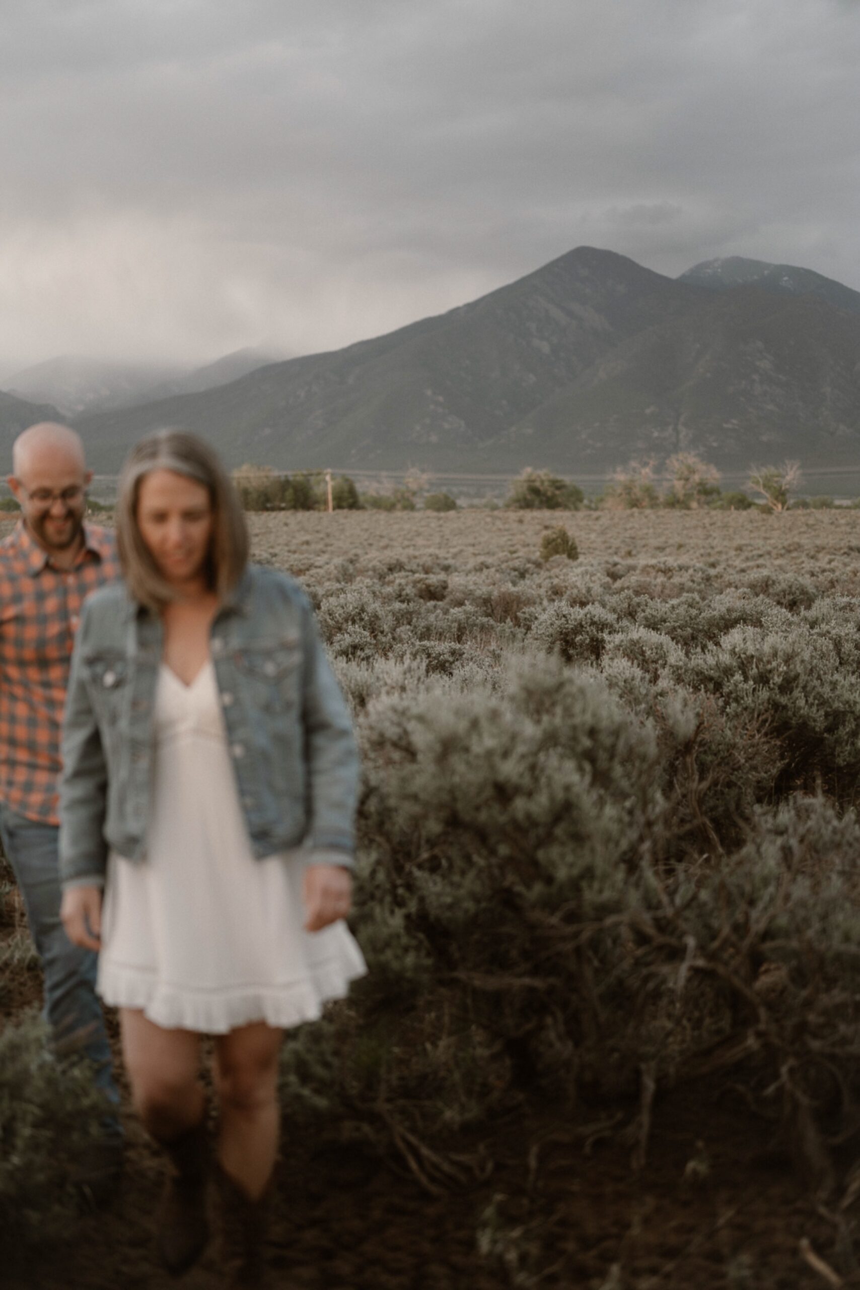 Engagement photos taken in downtown Taos, New Mexico. Photos by Telluride wedding photographer Ashley Joyce Photography.