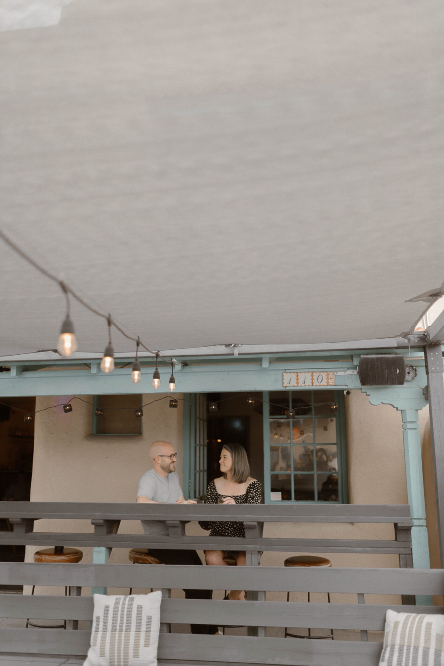 Engagement photos taken in downtown Taos, New Mexico. Photos by Telluride wedding photographer Ashley Joyce Photography.