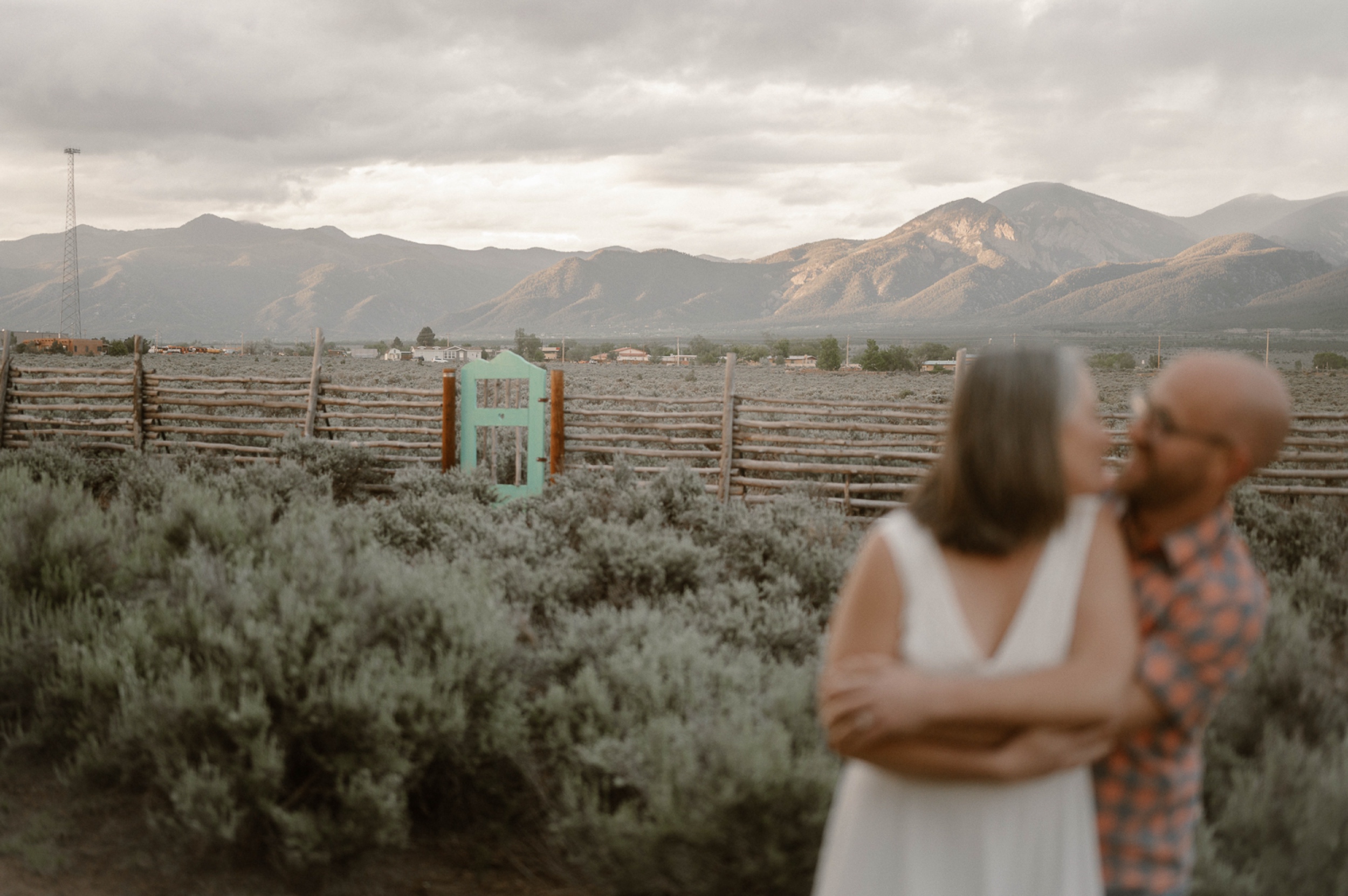 Engagement photos taken in downtown Taos, New Mexico. Photos by Telluride wedding photographer Ashley Joyce Photography.