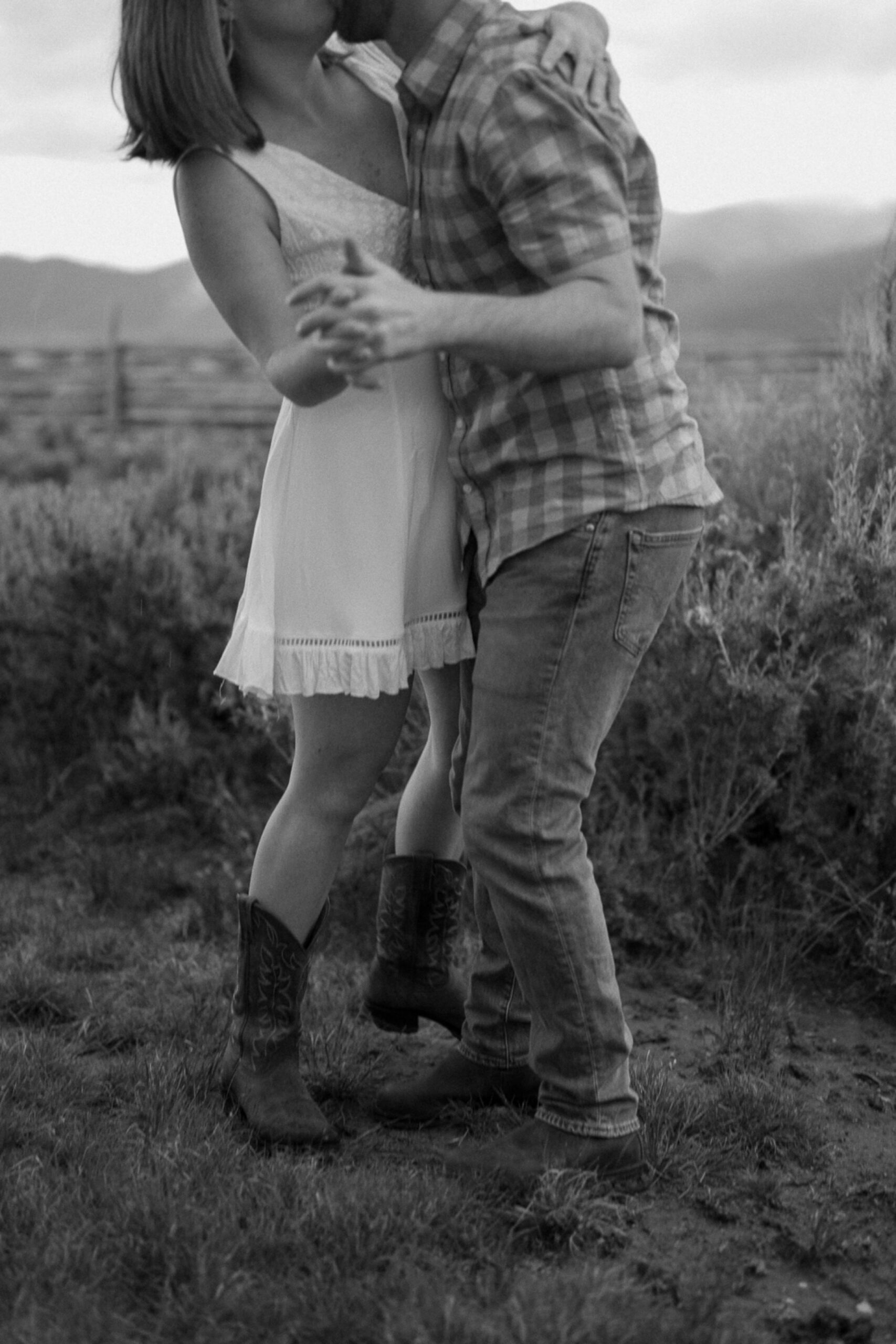 Engagement photos taken in downtown Taos, New Mexico. Photos by Telluride wedding photographer Ashley Joyce Photography.