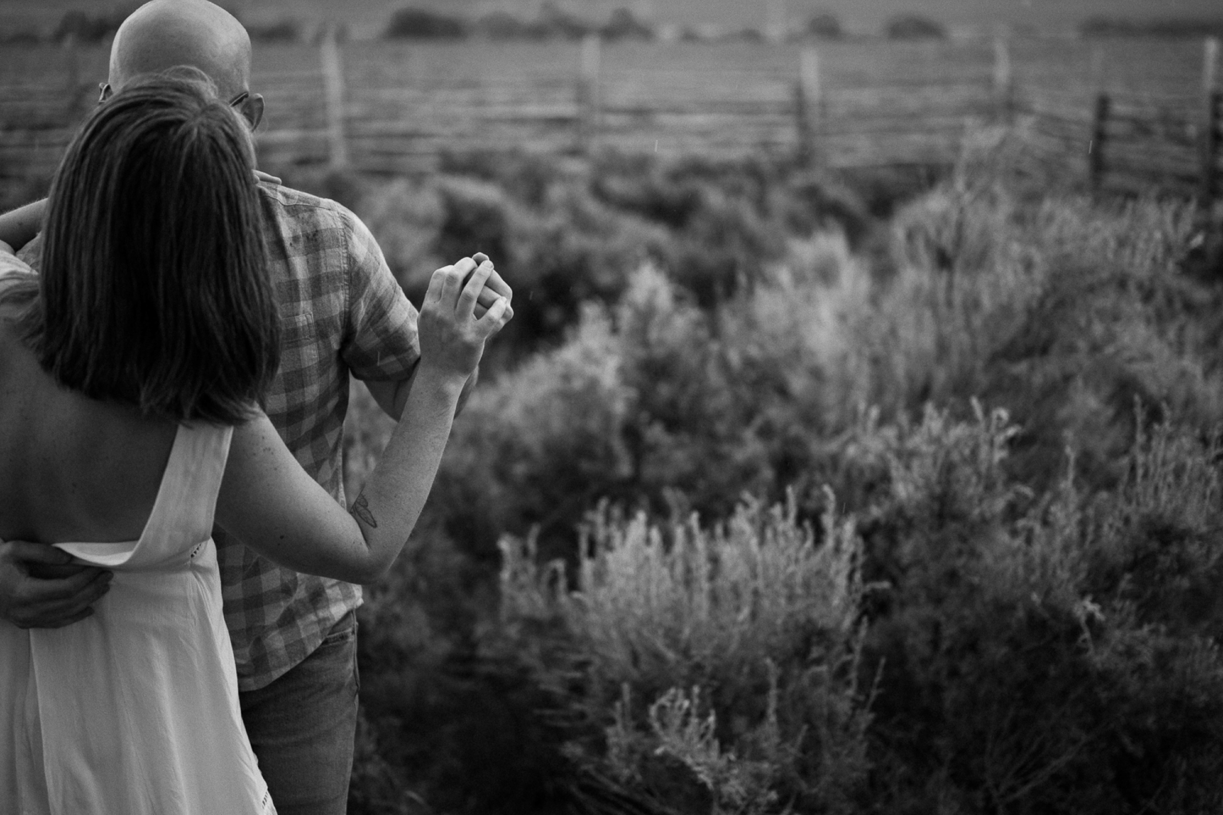 Engagement photos taken in downtown Taos, New Mexico. Photos by Telluride wedding photographer Ashley Joyce Photography.