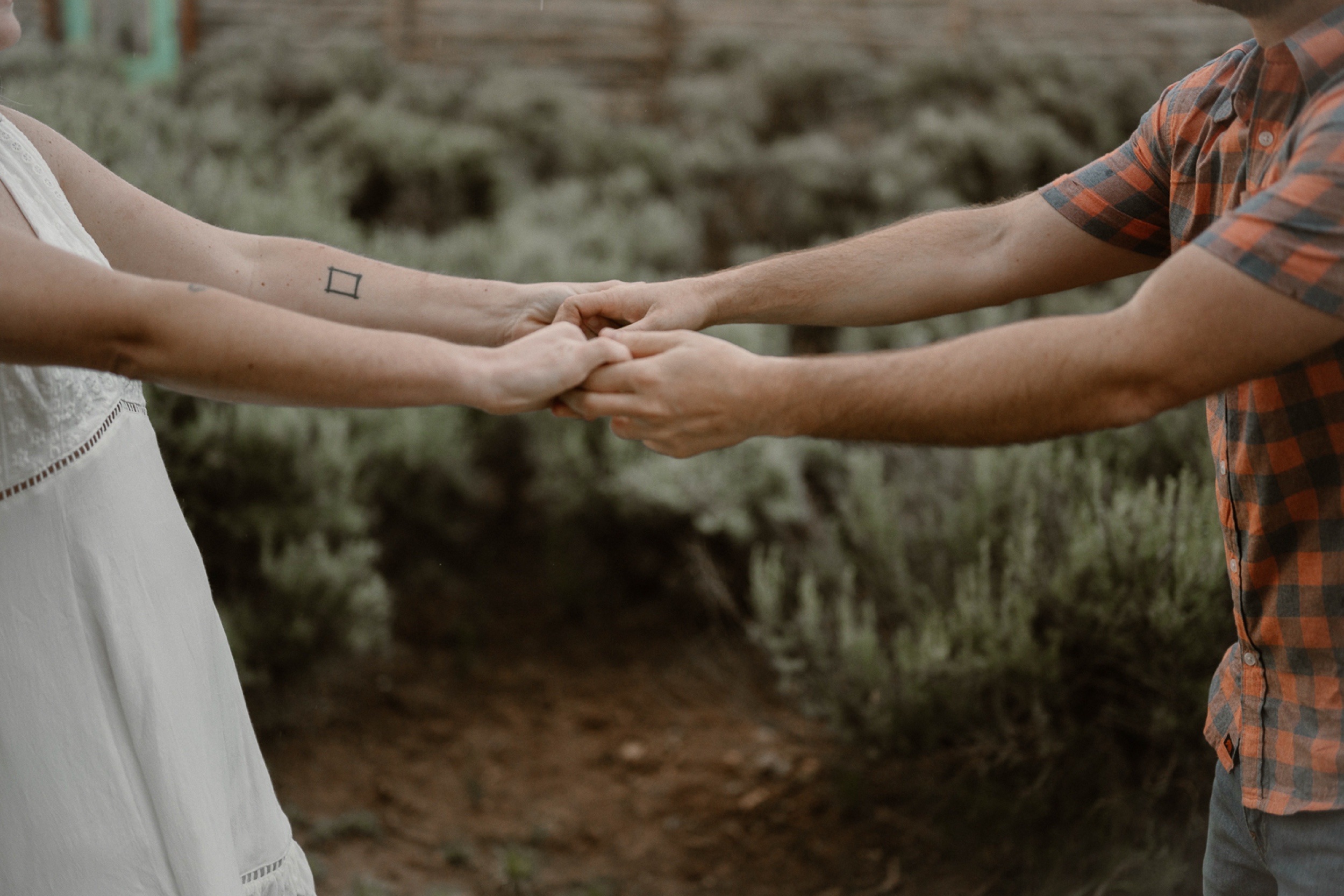 Engagement photos taken in downtown Taos, New Mexico. Photos by Telluride wedding photographer Ashley Joyce Photography.